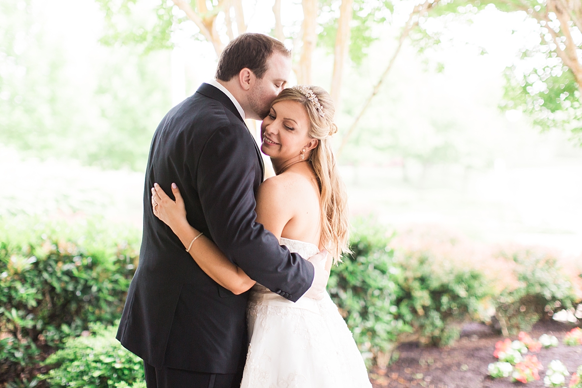 A romantic and timeless spring wedding at Stonewall Golf and Country Club in Gainesville, VA with catering by The Brass Cannon. 