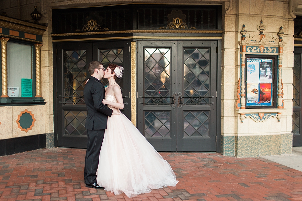 A classic and timeless winter wedding at John Marshall Ballroom in Richmond, VA where the bride wore a stunning, soft pink, Lazaro dress.