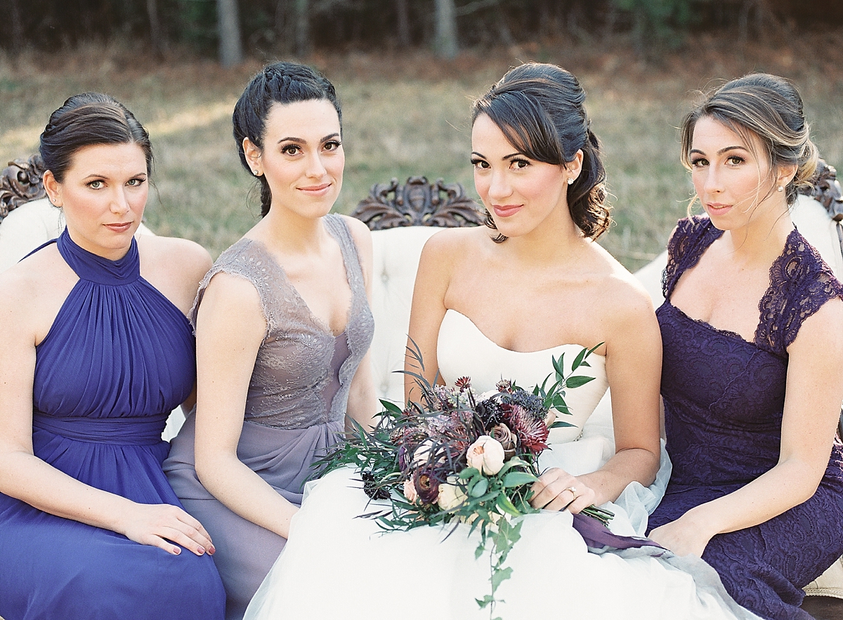 A stunning fairy tale inspired wedding at a private estate in Washington, DC that features a palette of deep purples with book page details at every corner. 