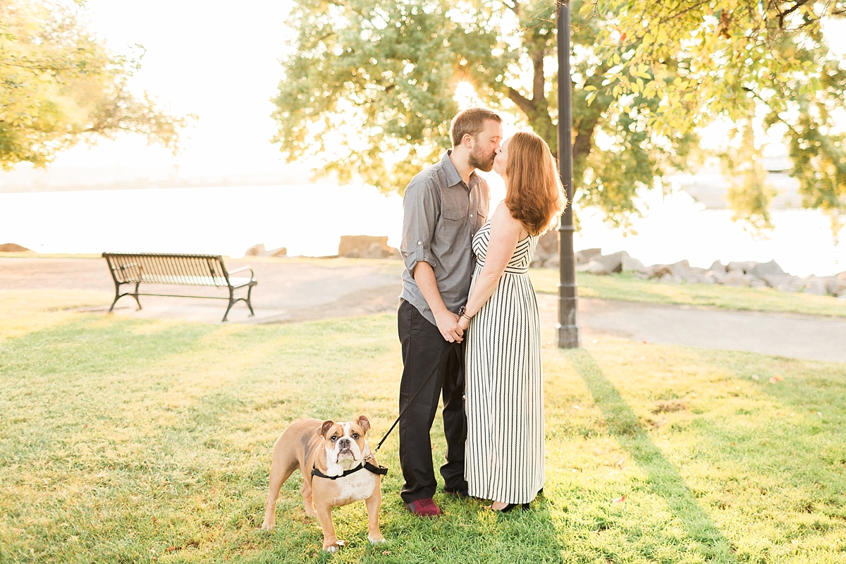 A summery engagement session in Old Town Alexandria, VA at sunrise with one sweet couple and an adorable bulldog. 