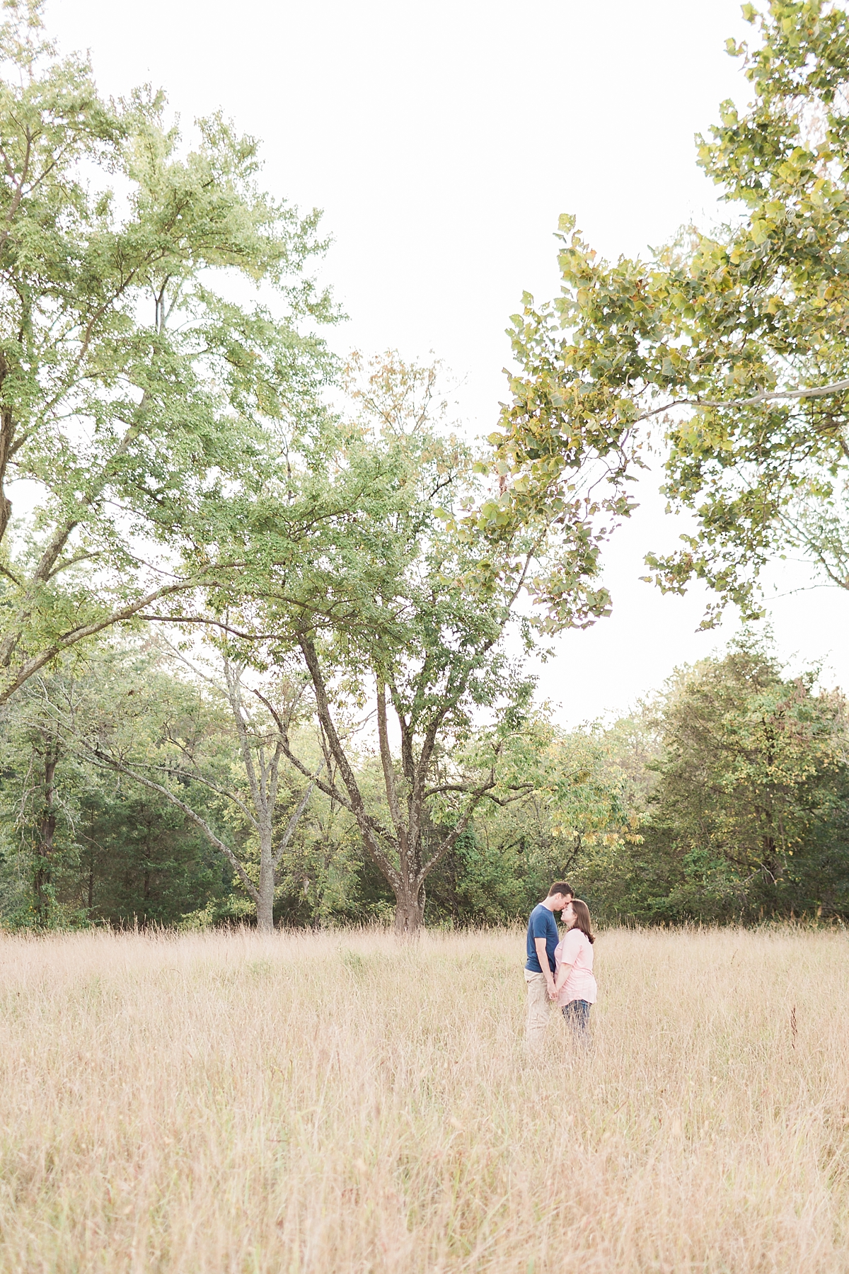 A rustic engagement session during sunset's golden hour in Manassas Battlefield Park of Virginia, just an hour west of Washington, DC. 