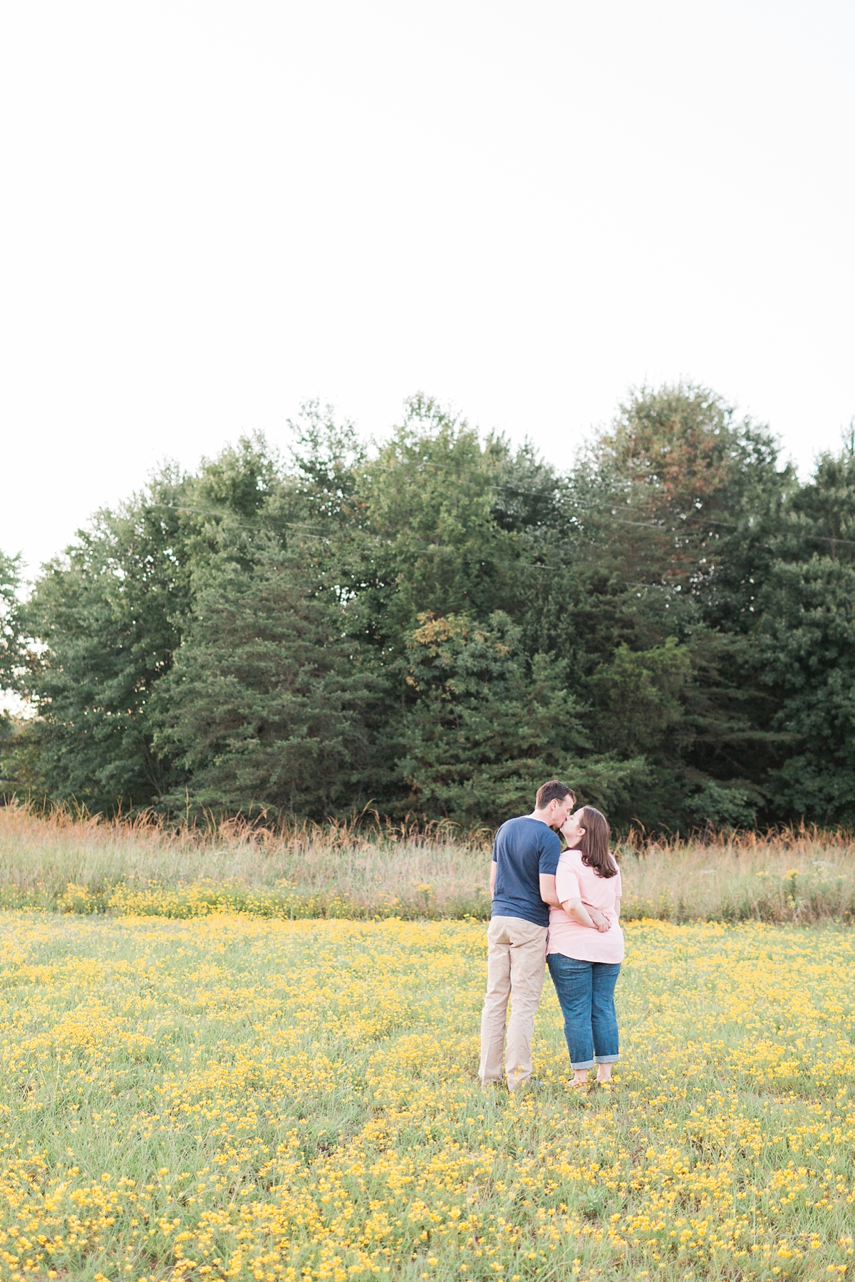 A rustic engagement session during sunset's golden hour in Manassas Battlefield Park of Virginia, just an hour west of Washington, DC.