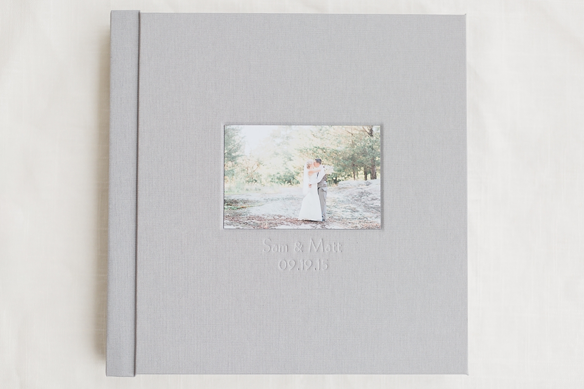 A professional lay flat album designed for a wedding at The Mill at Fine Creek in Powhatan, VA.