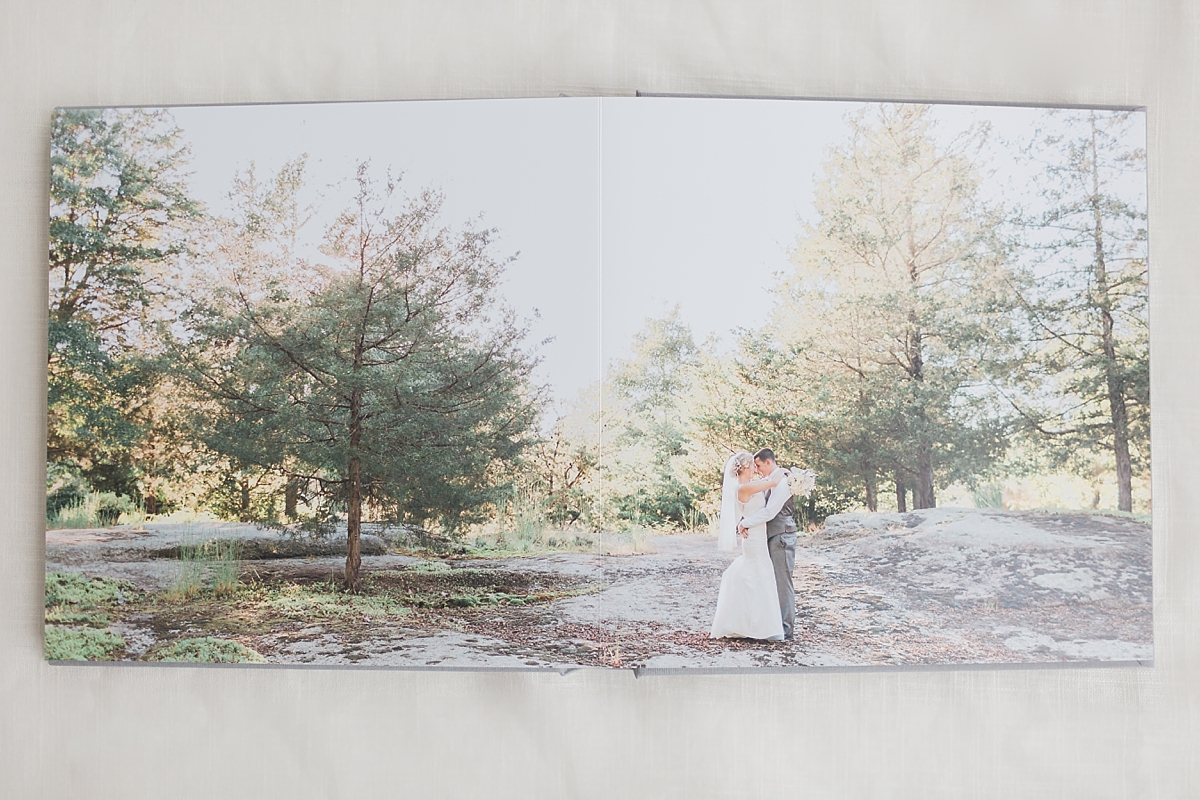 A professional lay flat album designed for a wedding at The Mill at Fine Creek in Powhatan, VA.