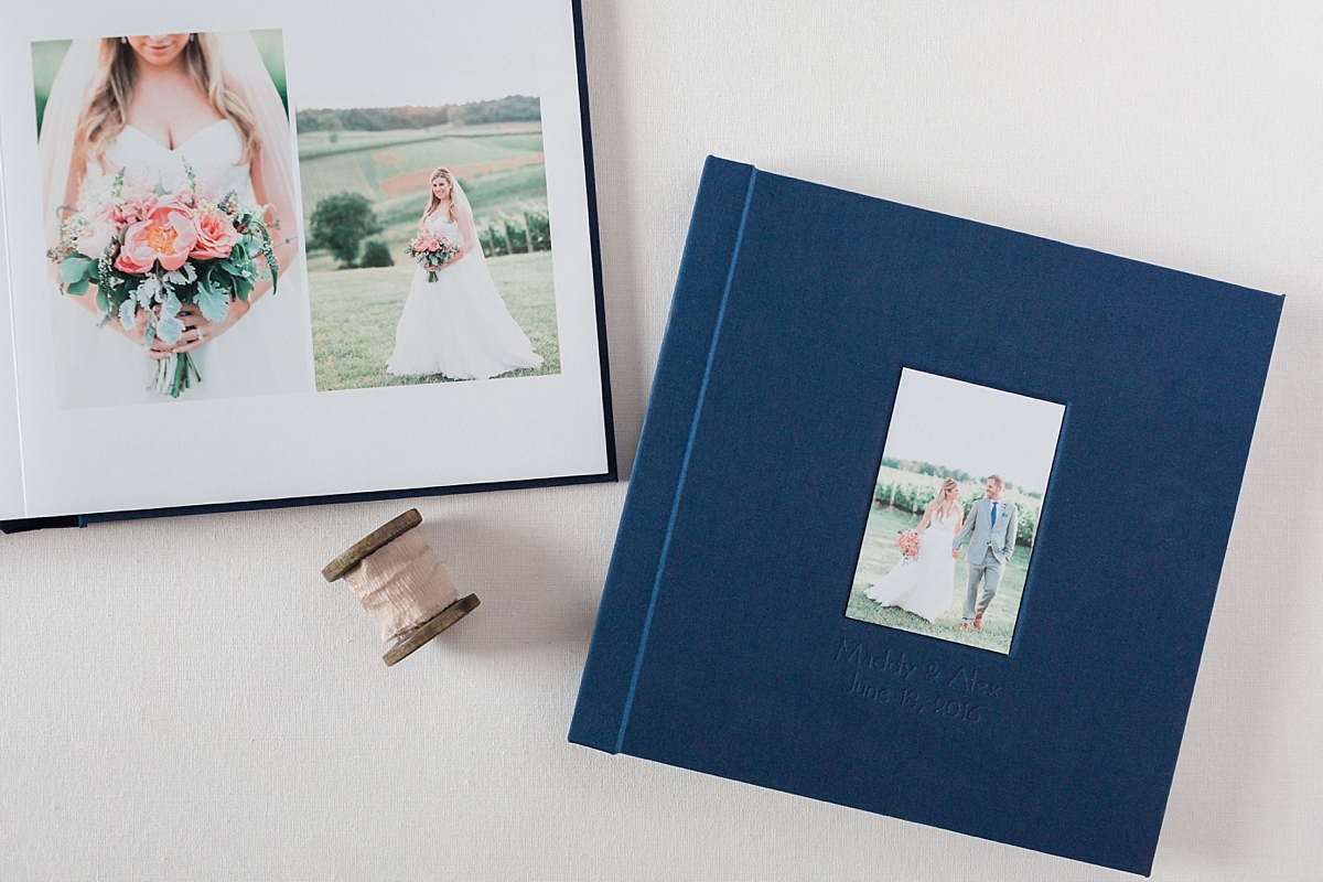 A gorgeous navy linen wedding album of images photographed by Washington, DC photographer Alicia Lacey at Stone Tower Winery in Leesburg, VA. 