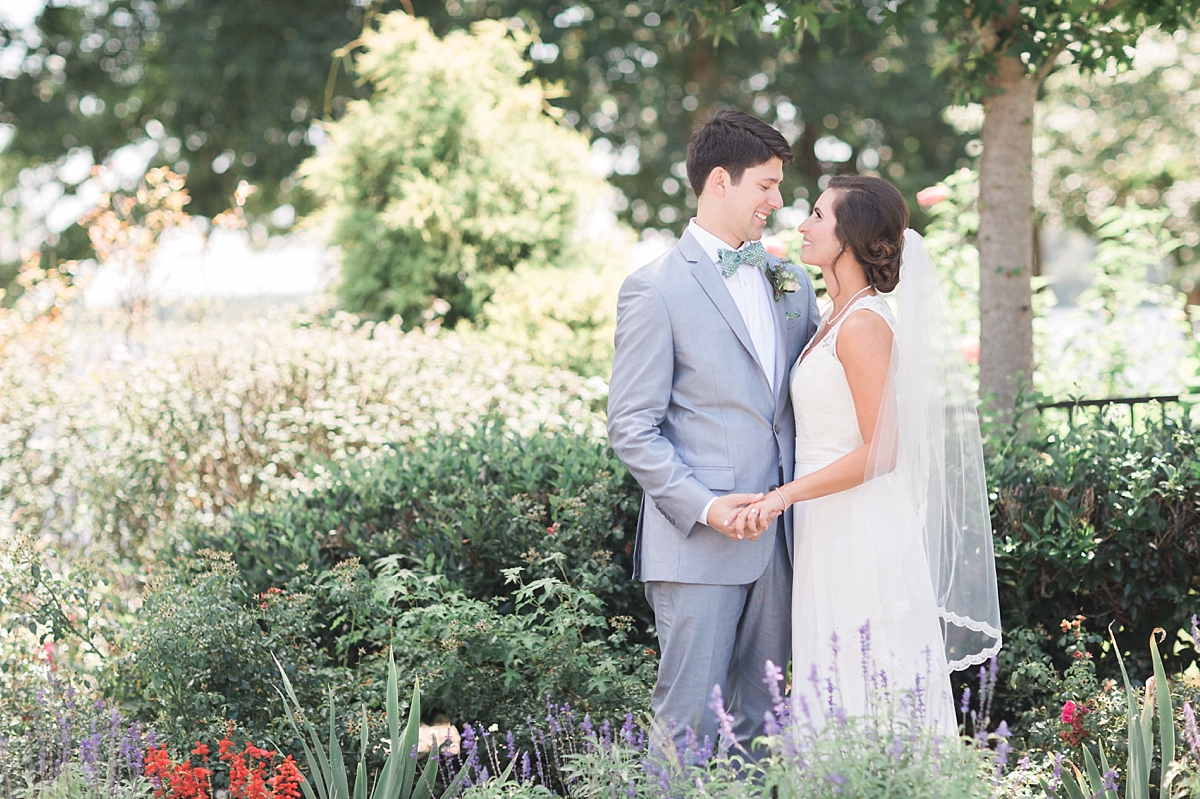 Enjoy a romantic summer garden party wedding photographed by DC fine art photographer, Alicia Lacey, at Fawn Lake Country Club in Fredericksburg, VA.