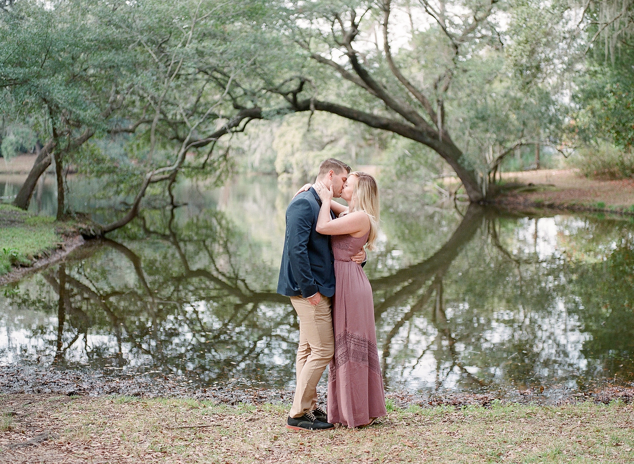 A romantic anniversary session is photographed at the historic wedding venue of Legare Waring House in Charleston, SC