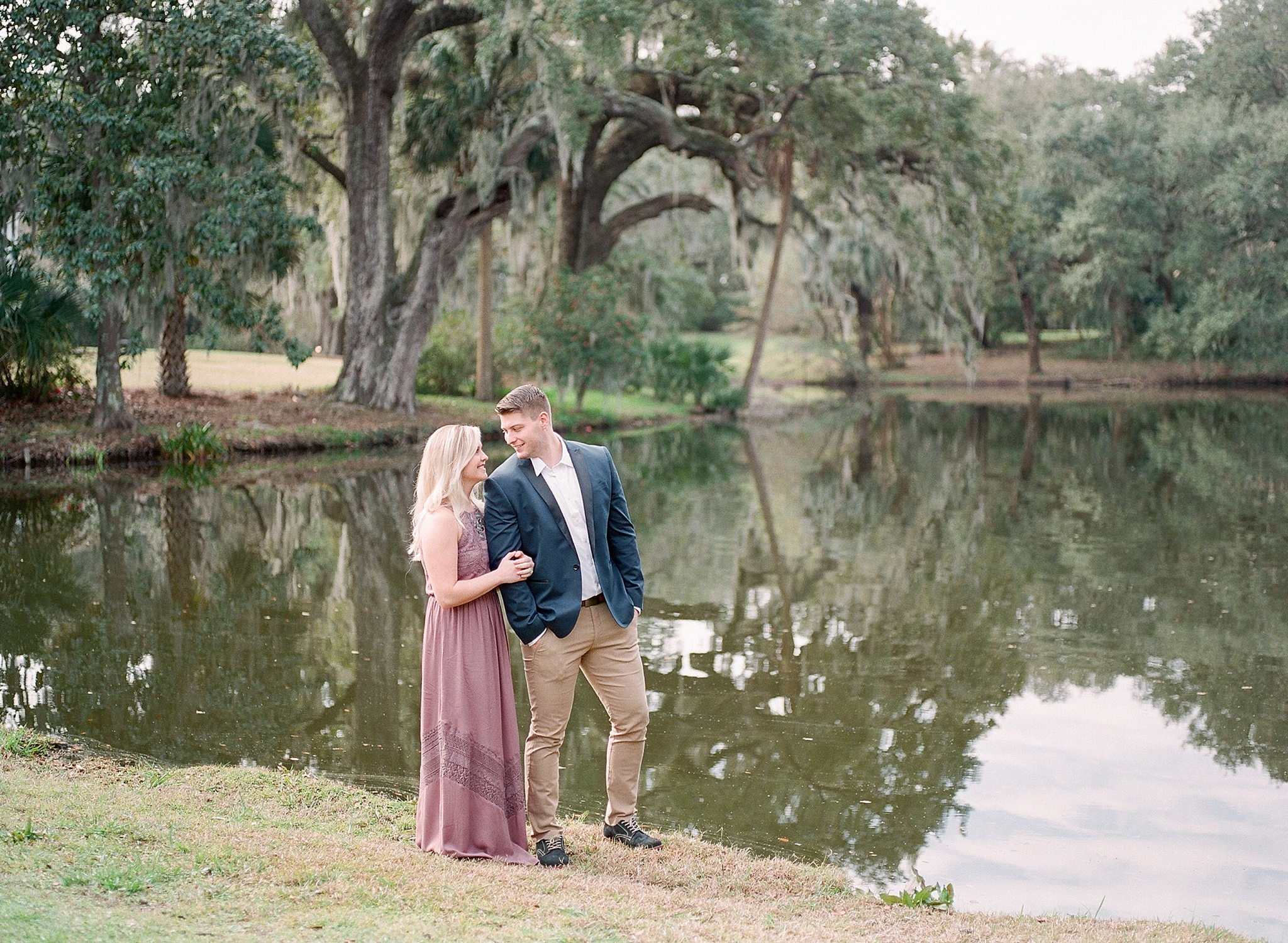 A romantic anniversary session is photographed at the historic wedding venue of Legare Waring House in Charleston, SC