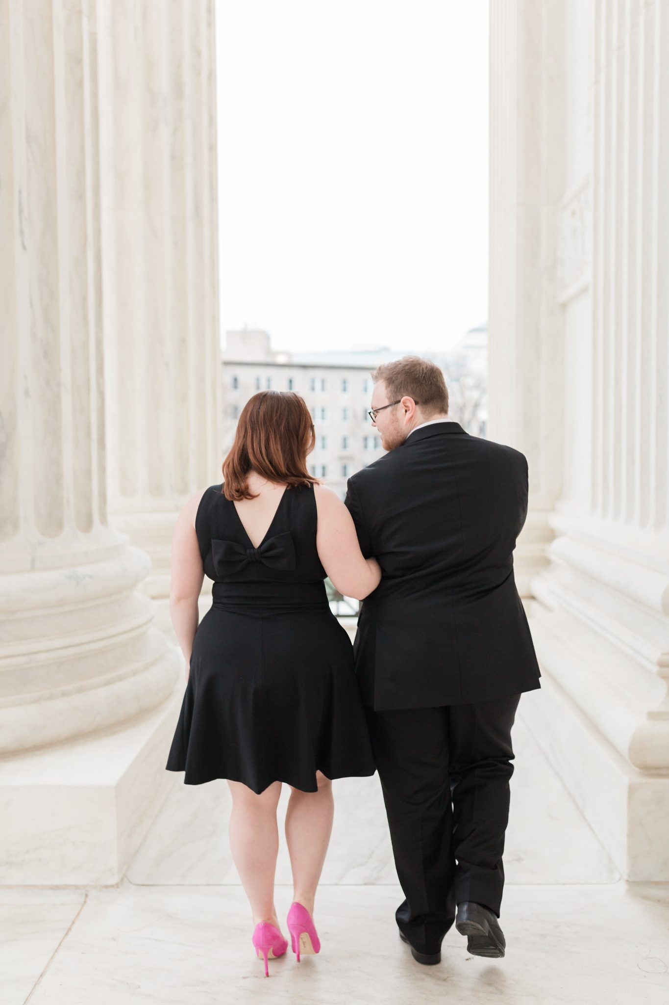 The iconic Supreme Court provides a stunning backdrop for spring engagement photos captured by Washington, DC wedding photographer, Alicia Lacey.