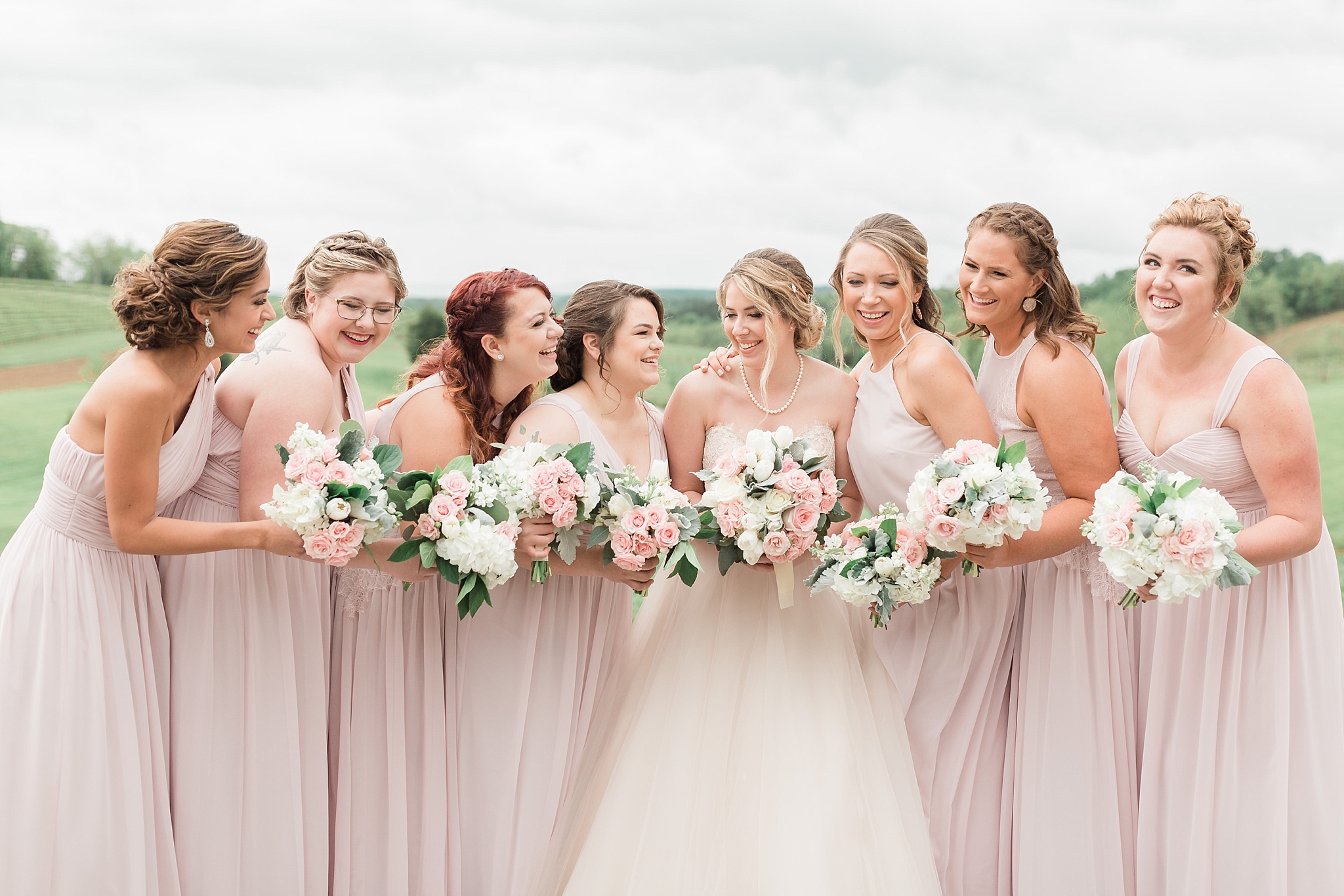 This gorgeous Stone Tower Winery wedding features a blush and cream color palette and is photographed by Washington, DC wedding photographer, Alicia Lacey. 