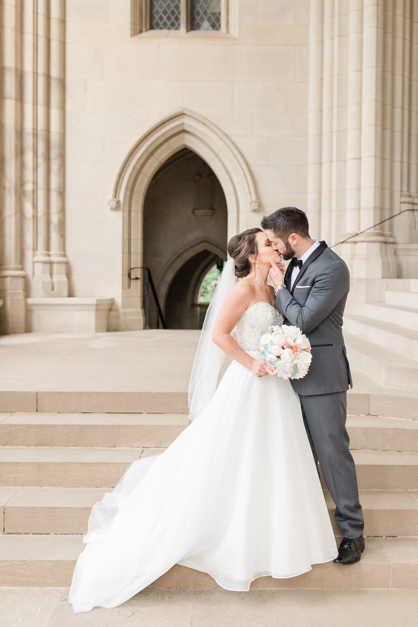 A gorgeous spring wedding is held at Washington, DC's Fairmont Hotel with portraits at Washington National Cathedral.