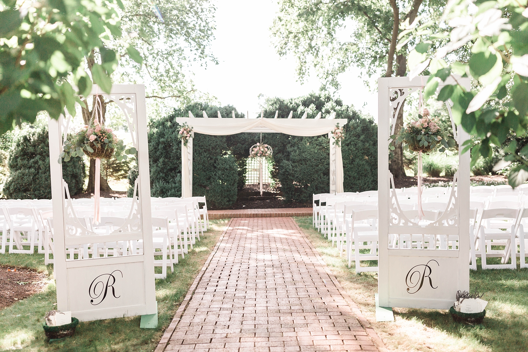 This Inn at Willow Grove Wedding in Orange, VA features a travel themed affair as a nod to the bride and groom's guests from across the world!