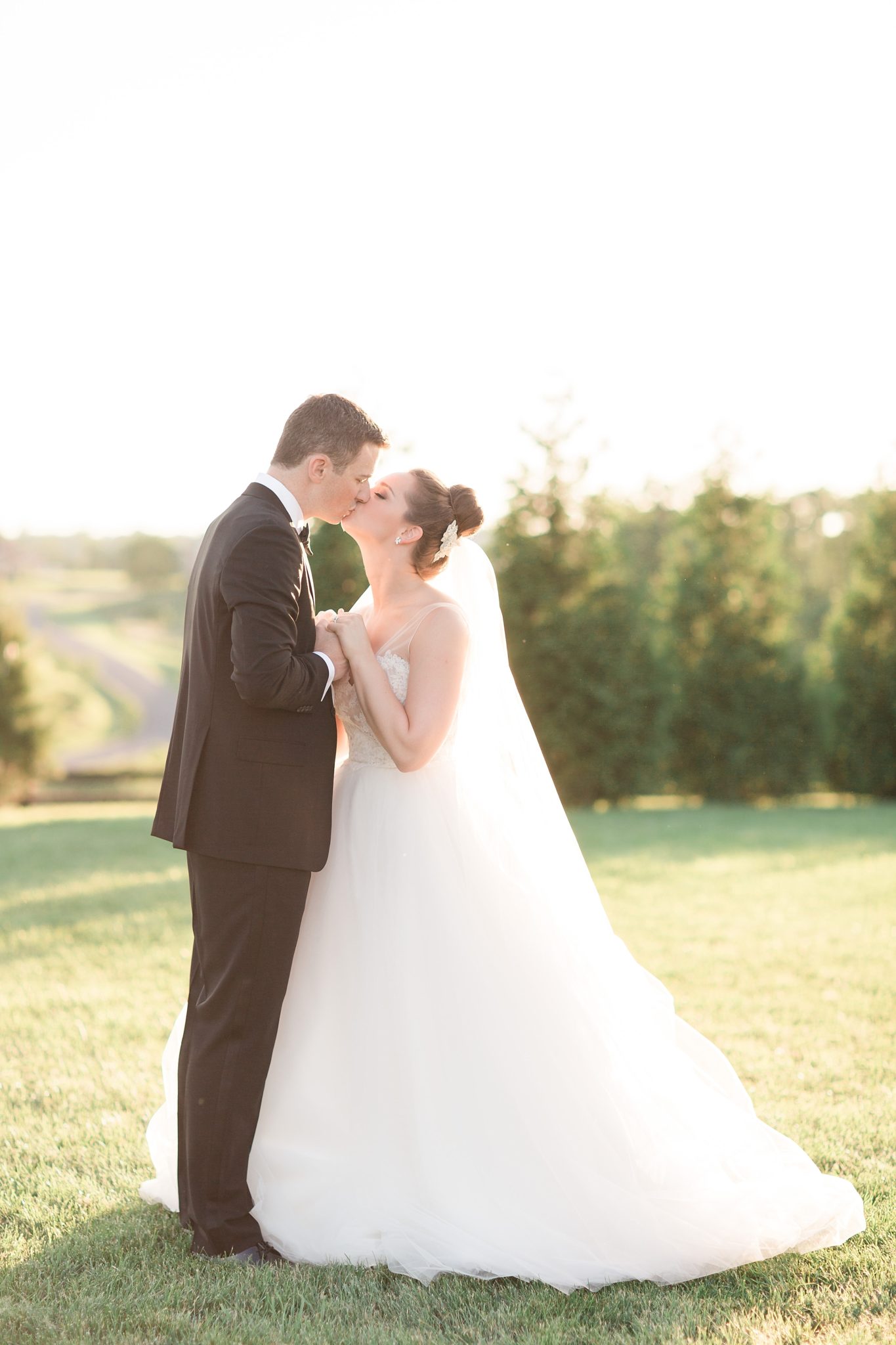 An intimate summer wedding is held at Shadow Creek Events in Loudoun County, VA. Images photographed by Washington, DC wedding photographer, Alicia Lacey