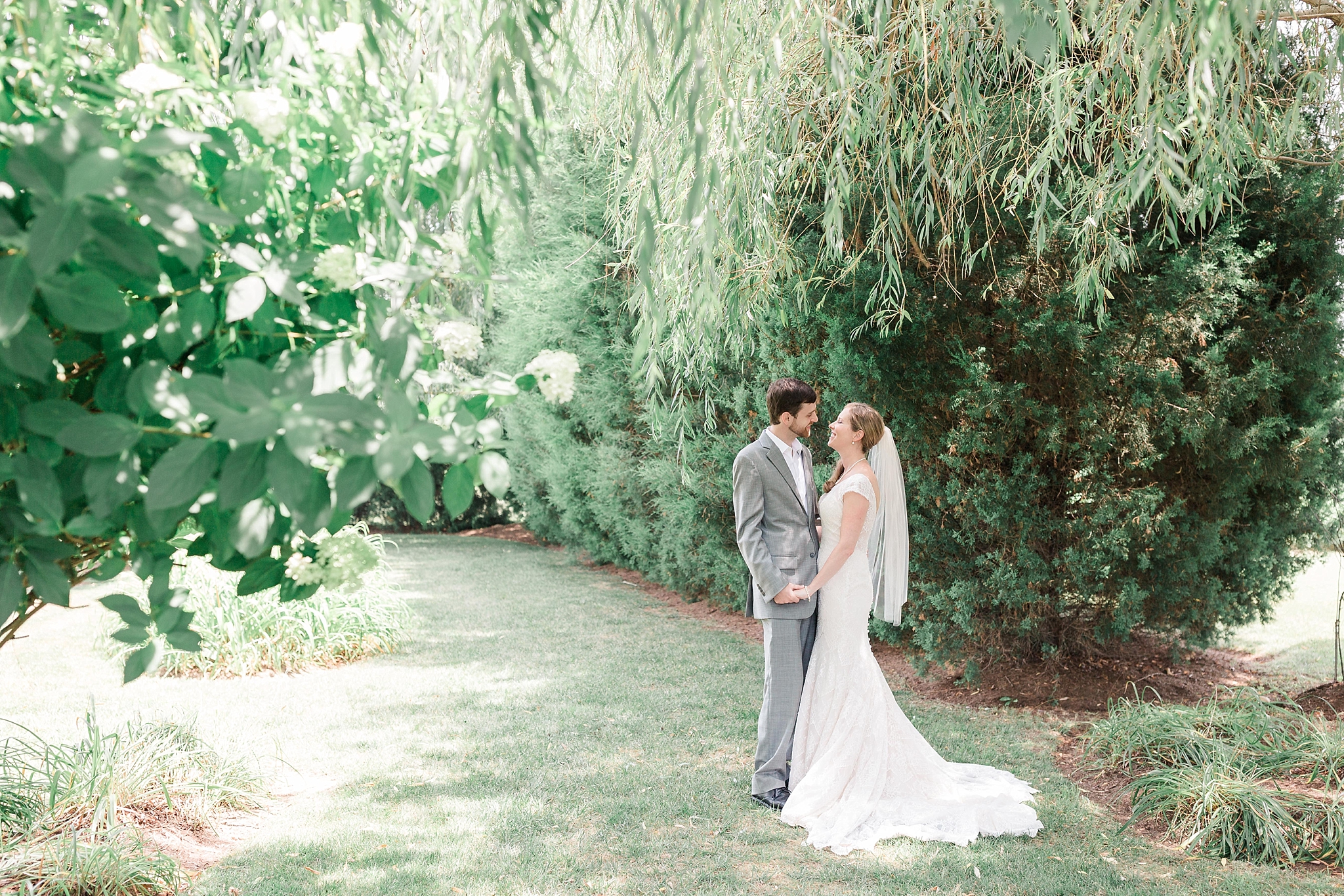 A sweet summer wedding is captured at The Inn at Huntingfield Creek in Rock Hall, MD on the Eastern Shore by Washington, DC photographer, Alicia Lacey.