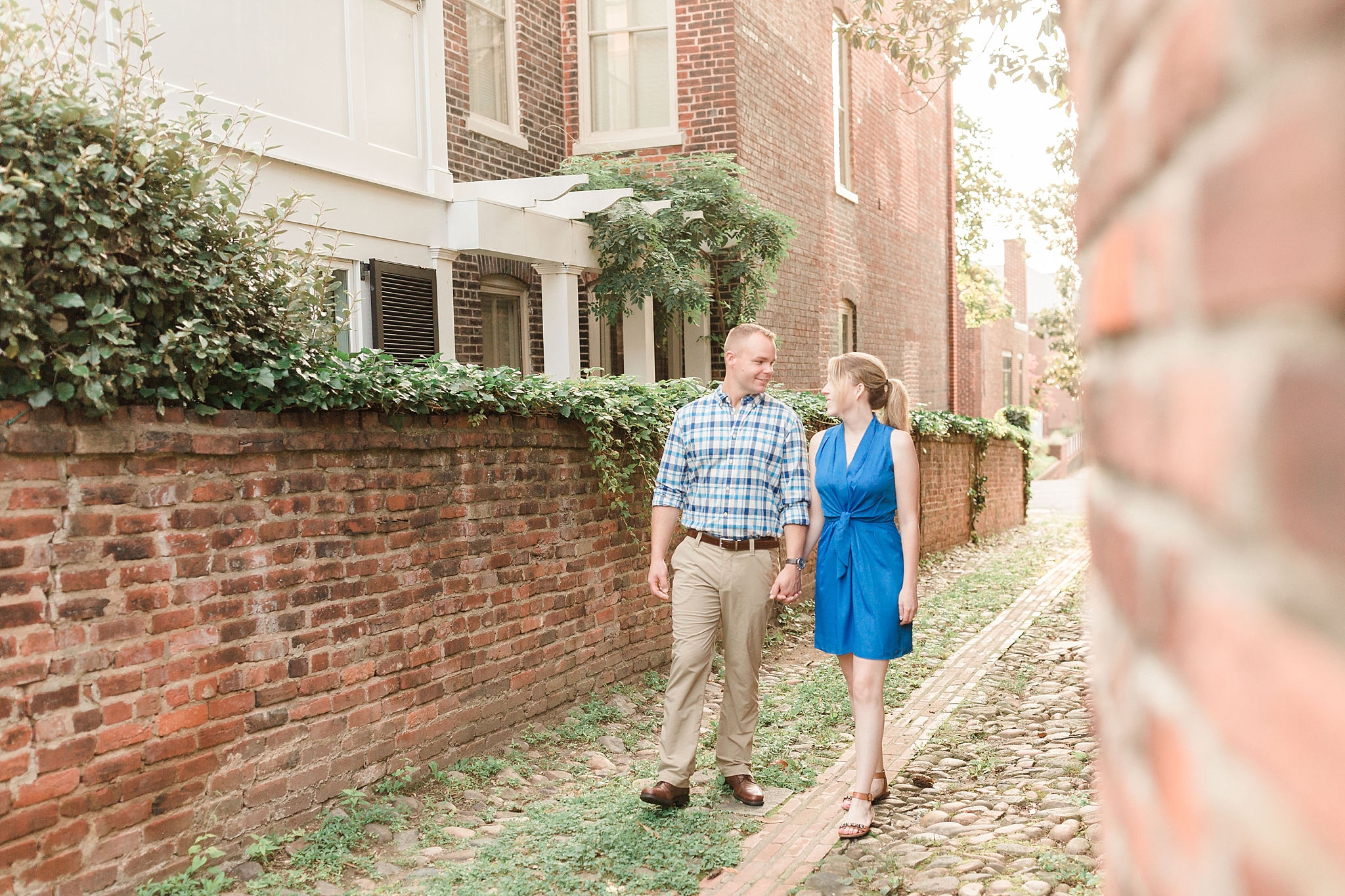 A romantic sunrise engagement session is photographed on the waterfront in Old Town Alexandria, VA by DC wedding photographer, Alicia Lacey. 