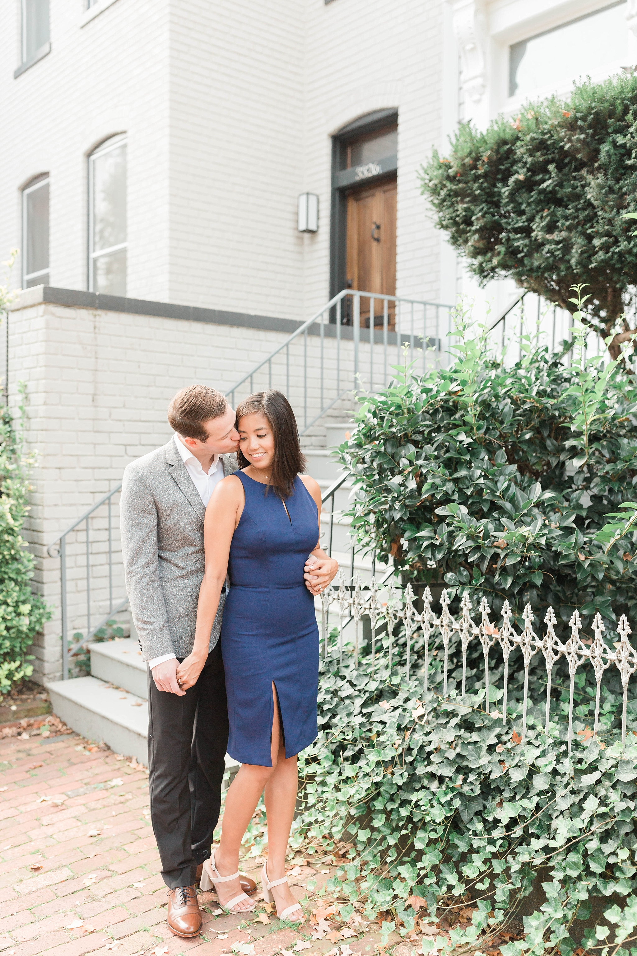A romantic sunrise engagement session in the Georgetown area of Washington, DC features the stylish couple's Vespa. 