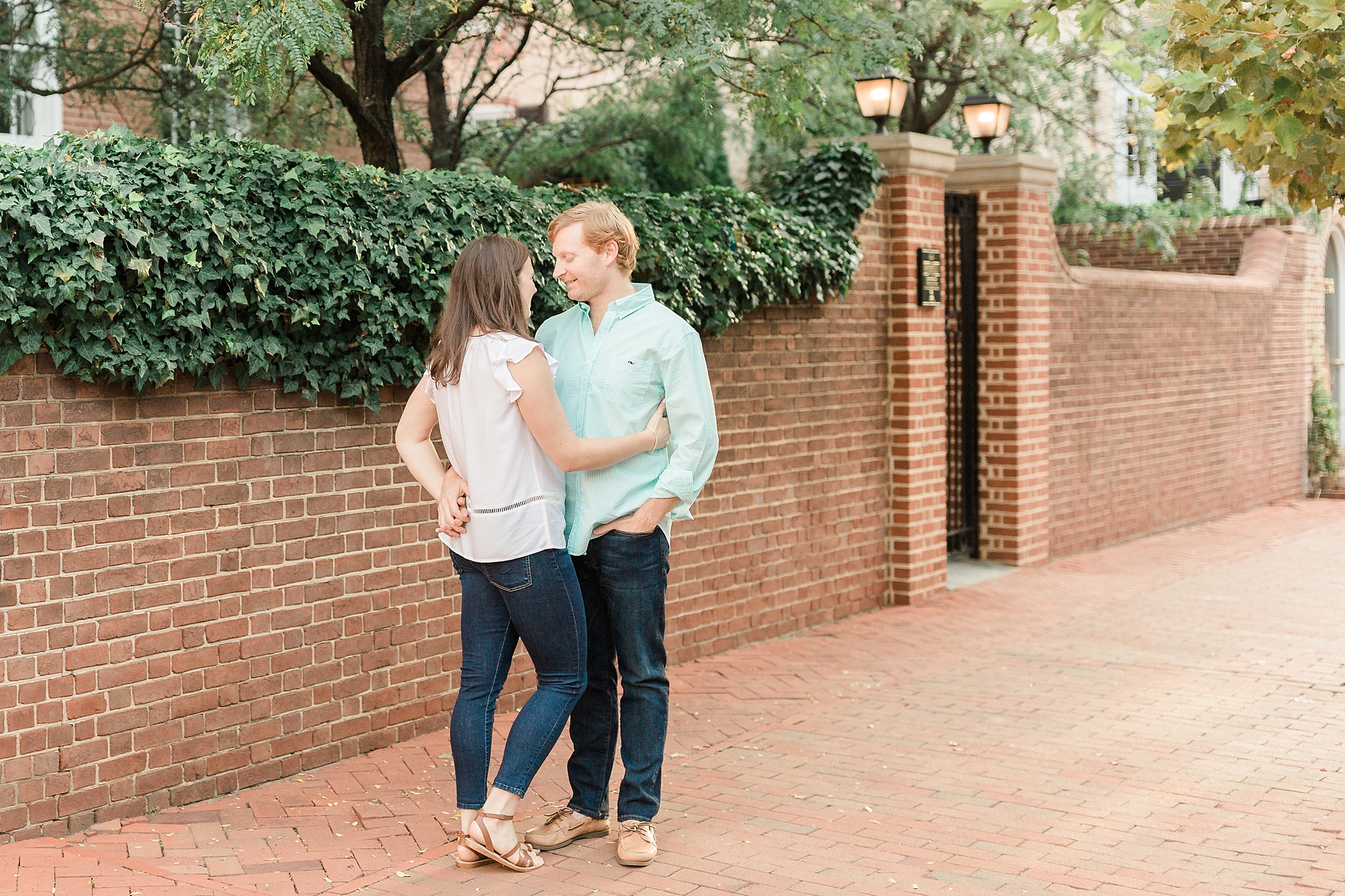 A romantic engagement session at Washington National Cathedral in DC is full of love, laughter, and lots of lush florals from the Bishop's Garden!