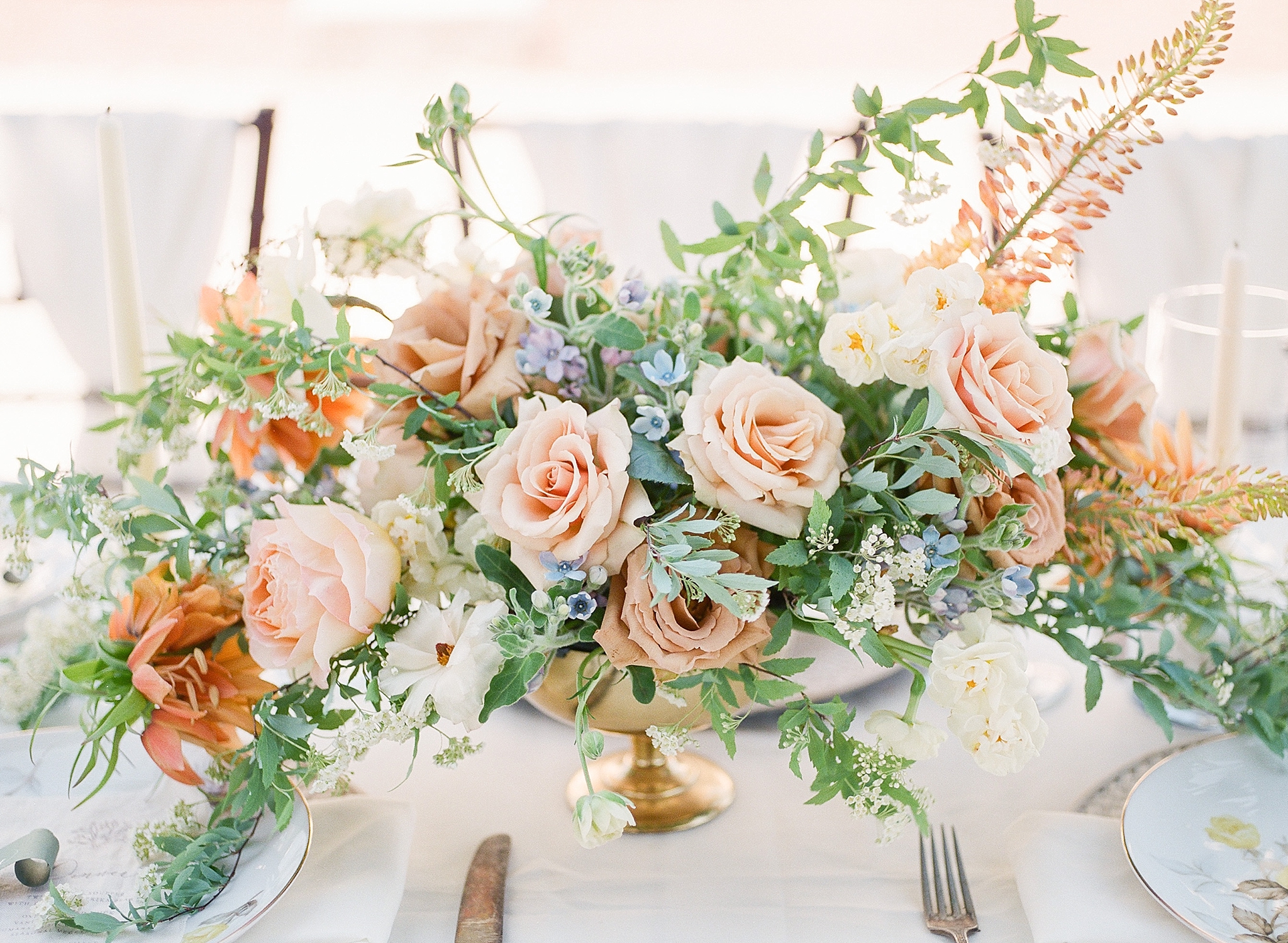 A stunning garden wedding at Oatlands Historic House in Leesburg, VA features a soft autumnal theme as a nod to the season.