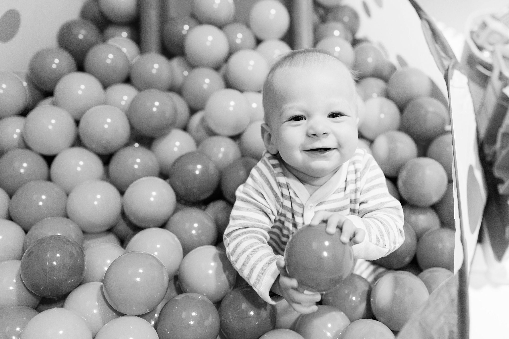 This DC wedding photographer shares personal photos of her new son, Landon James, from months seven through nine of his life.