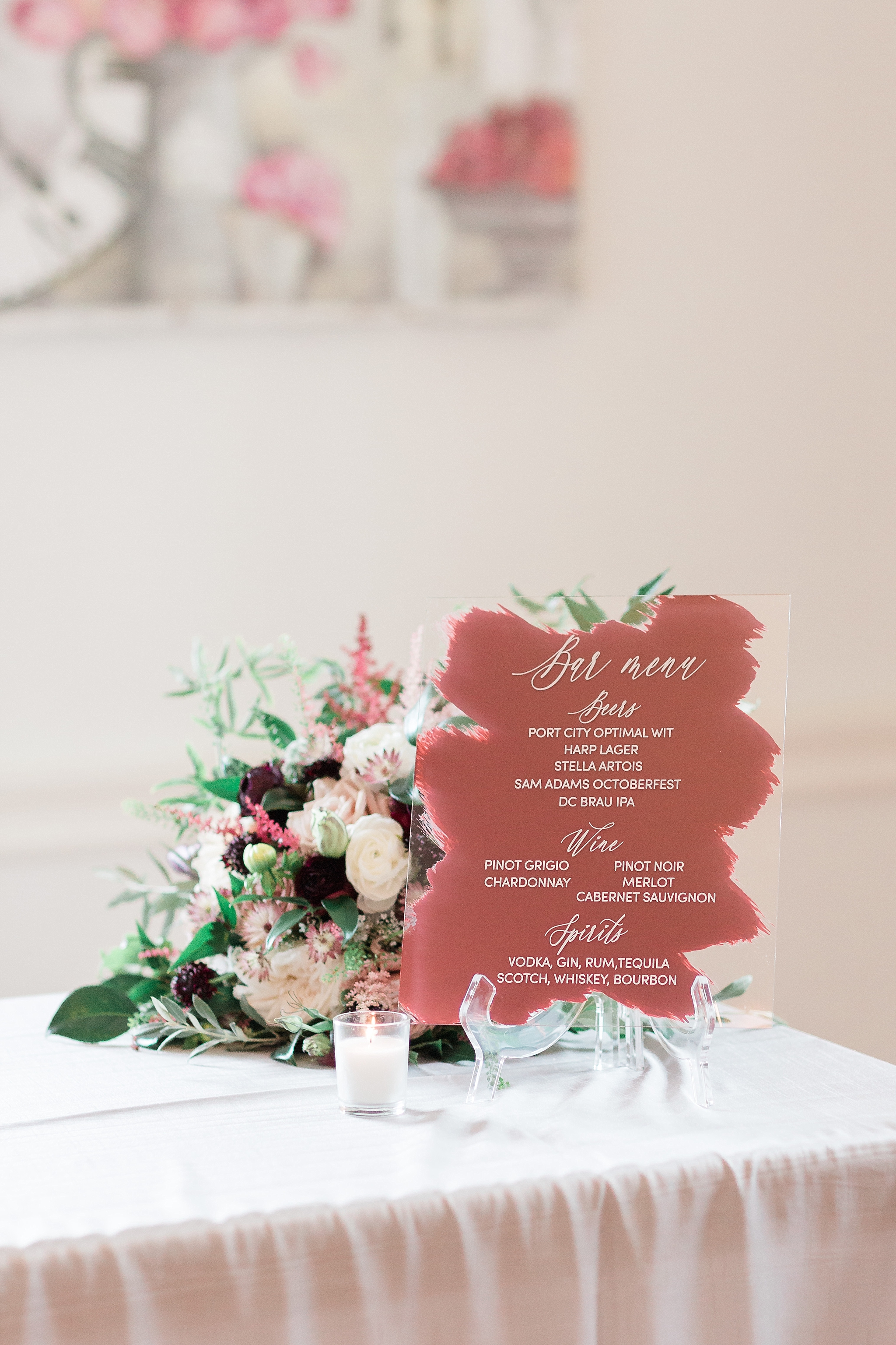 A chic and elegant wedding at The Rust Manor House in Leesburg, VA is full of handmade touches including a custom bar, dance floor, and hand-painted signage! 