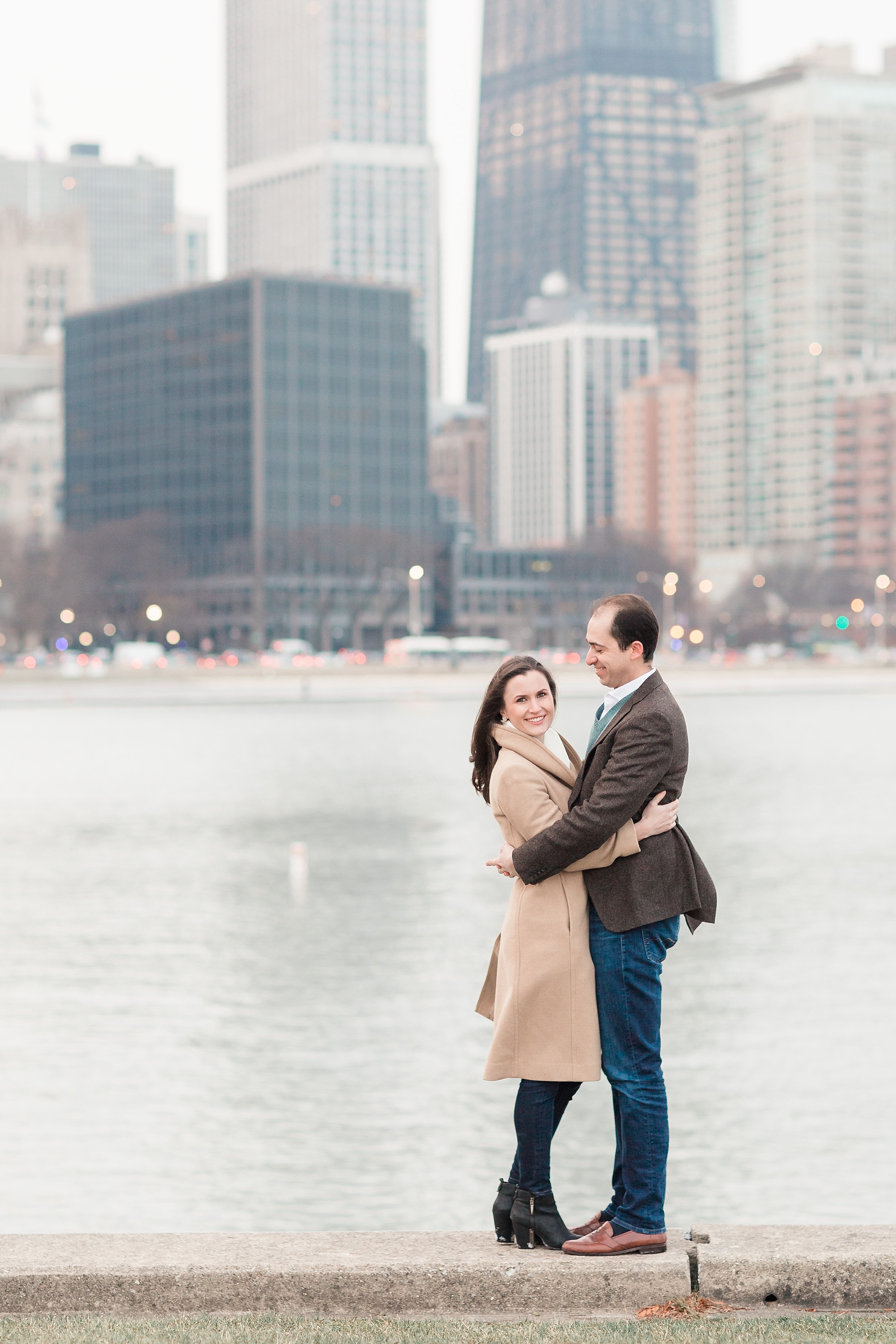 A stylish engagement session in downtown Chicago at iconic sites such as the Wrigley Building, the Riverwalk, and even in the middle of Michigan Avenue!