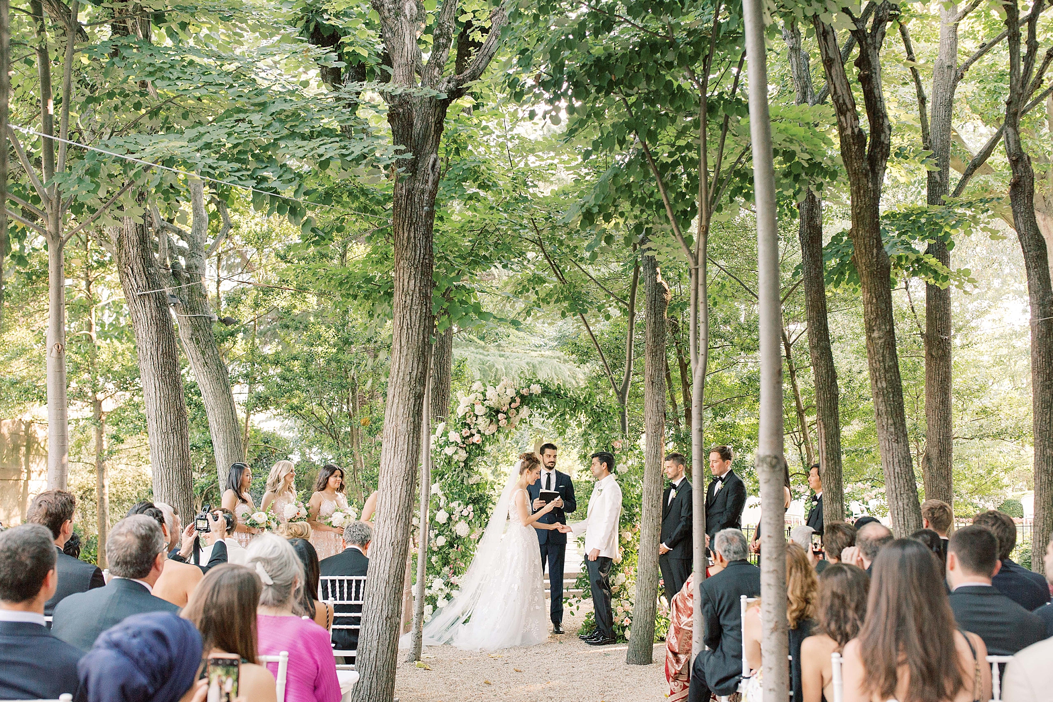 Wedding ceremony in the Linden Grove at the Meridian House in Washington, DC.