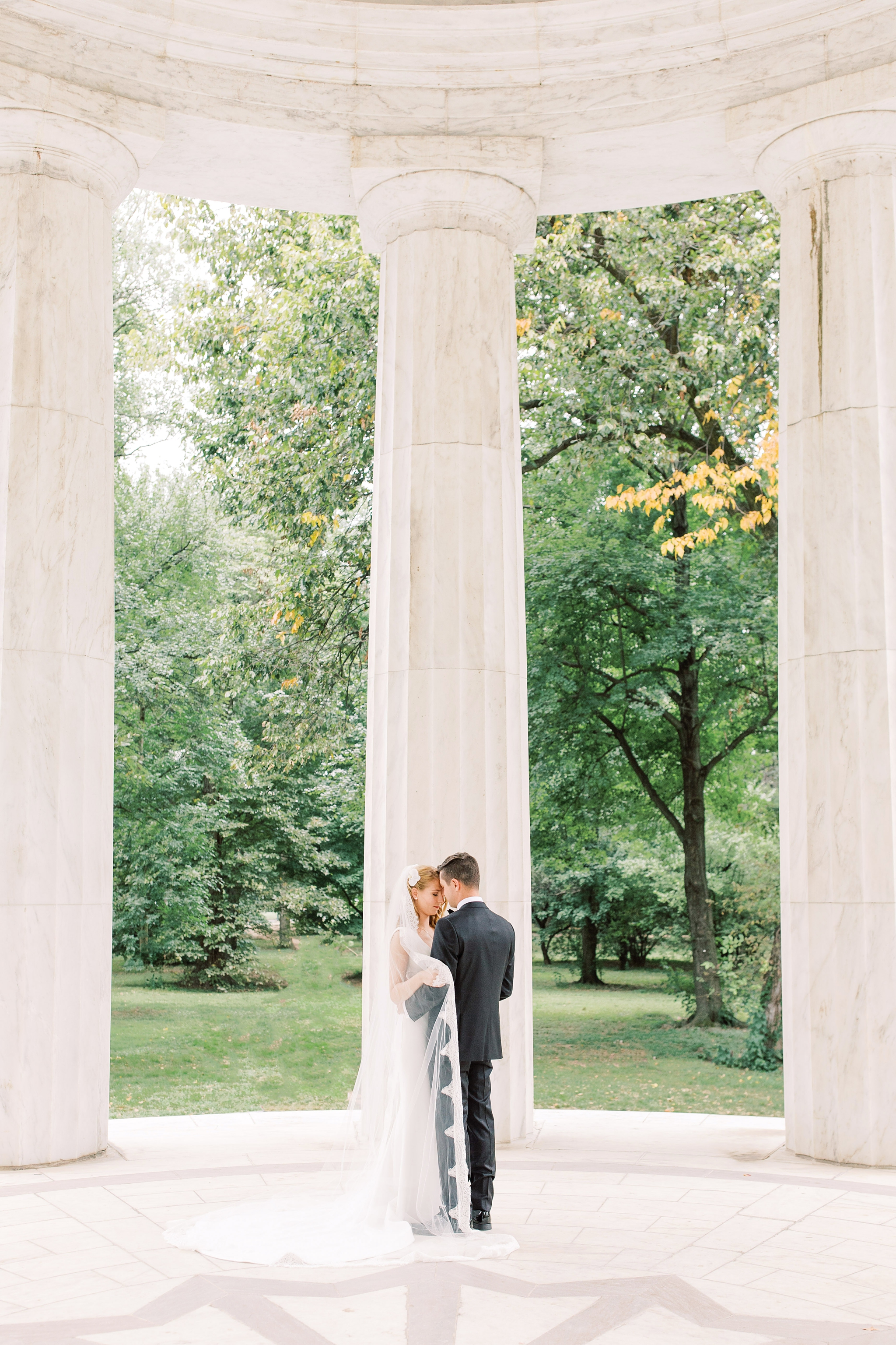 A colorful summer wedding at District Winery in Washington, DC with portraits at the Lincoln Memorial and DC War Memorial.