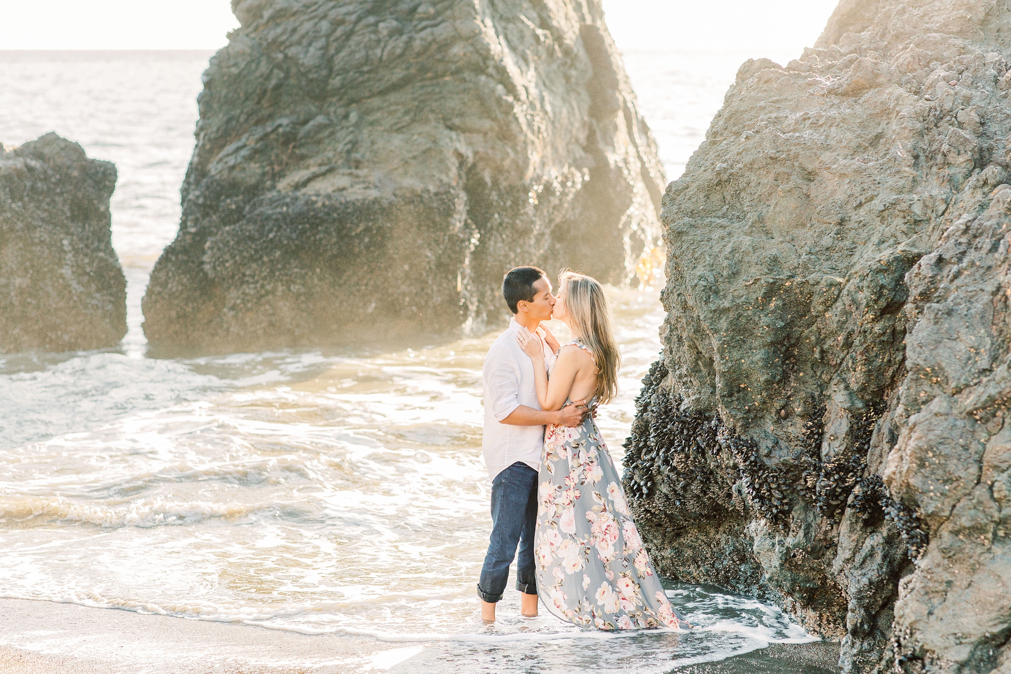 A romantic sunset engagement session at Rodeo Beach in Marin Headlands and Sutro Baths outside of San Francisco, CA.