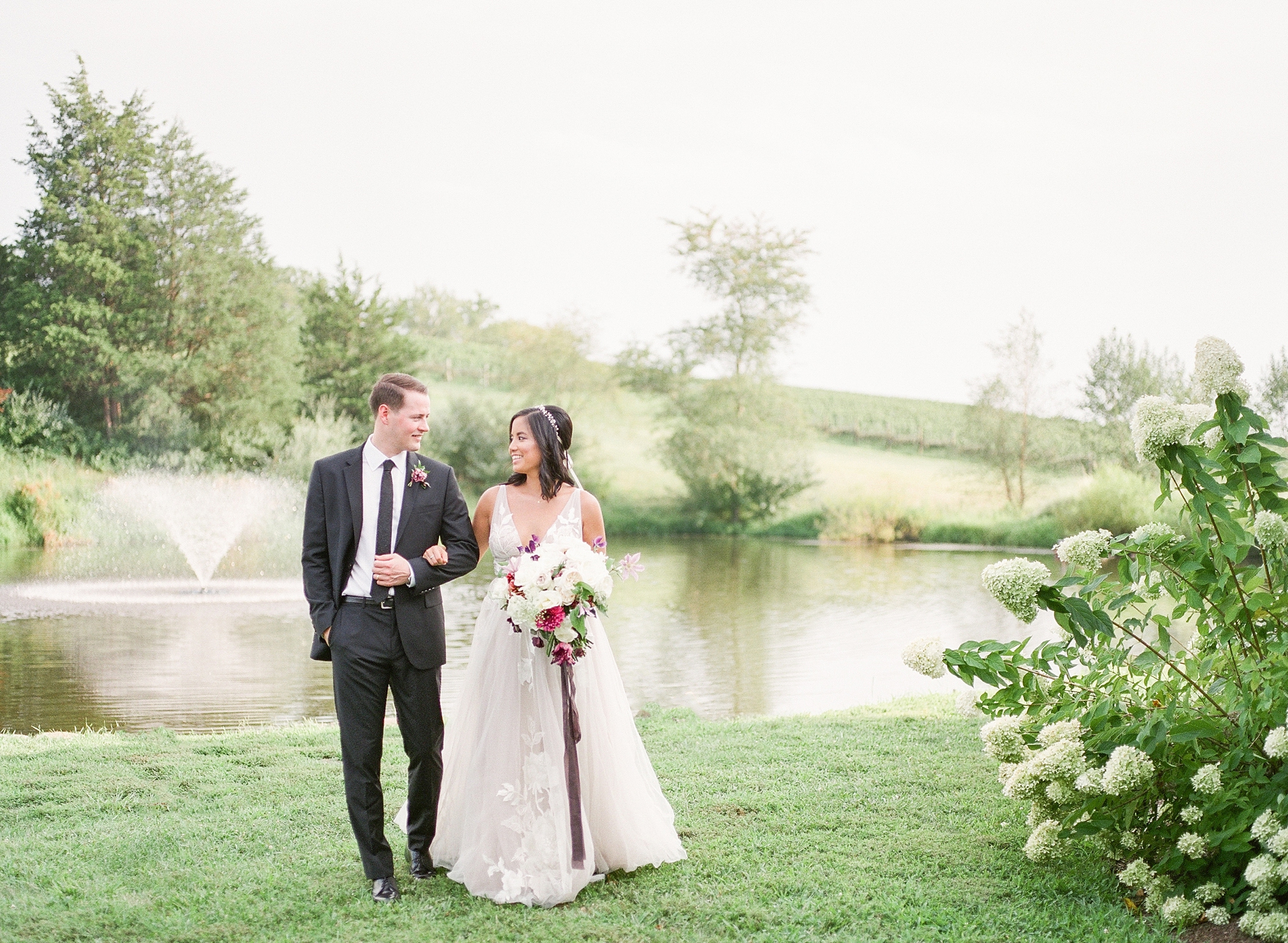 An intimate and romantic wedding at Stone Tower Winery in Leesburg, VA that features a 'figs and blues' theme with a fun play on color for the fall season.