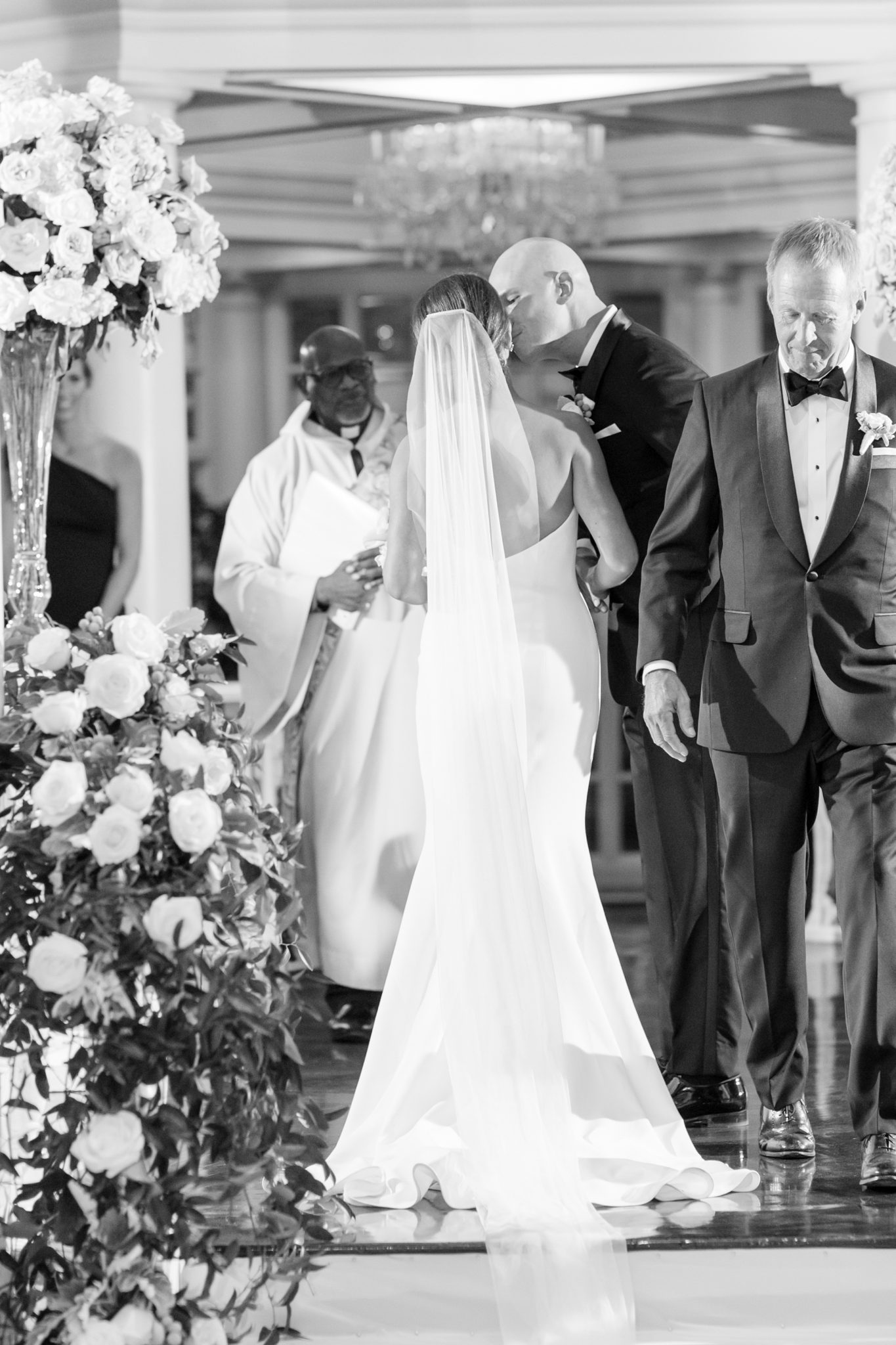 An elegant December wedding at the Fairmont Hotel in Washington, DC designed by EVOKE with florals by Amaryllis. 