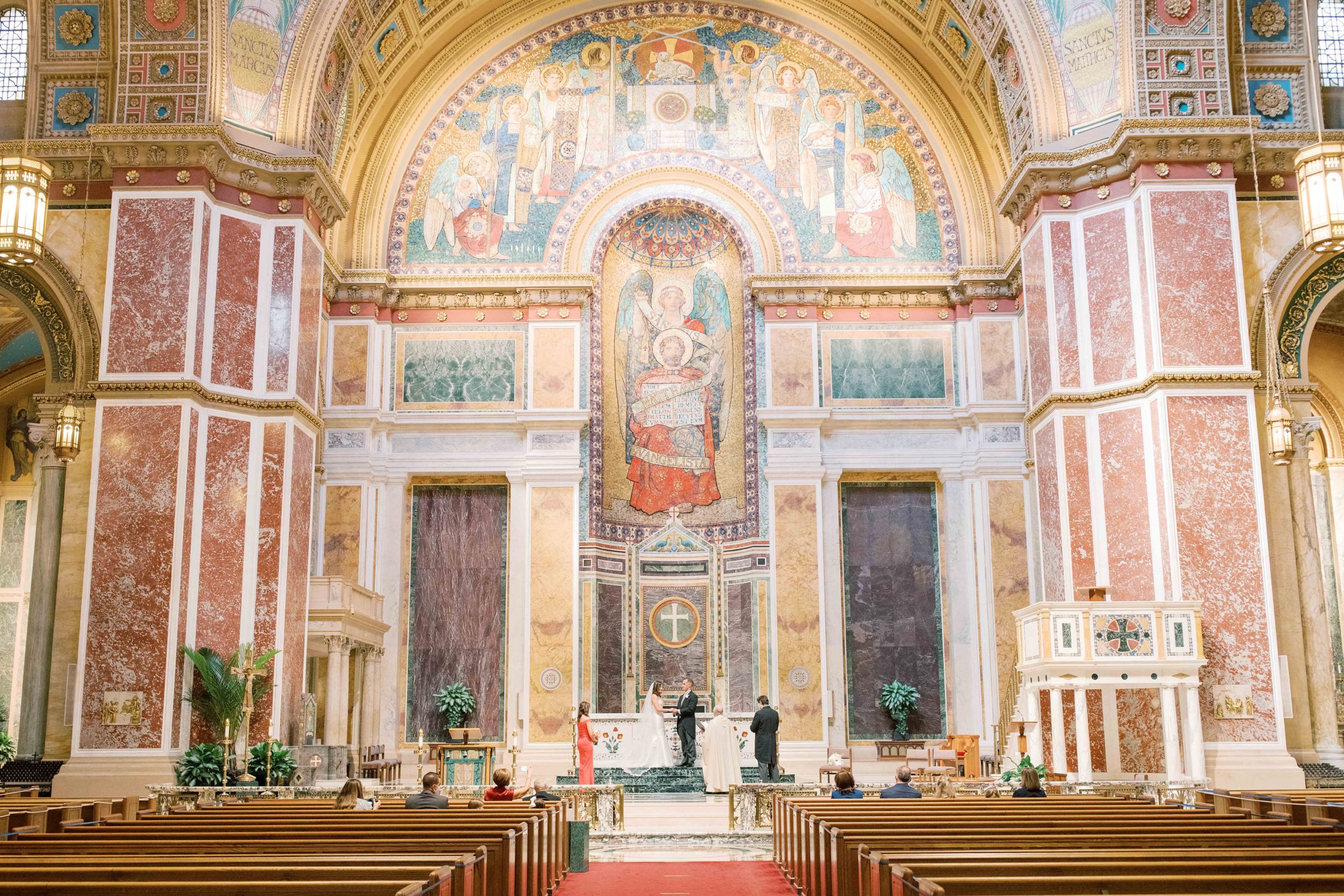 A romantic elopement wedding at St. Matthews Cathedral in Washington, DC with portraits at the DC War Memorial and Lincoln Memorial.
