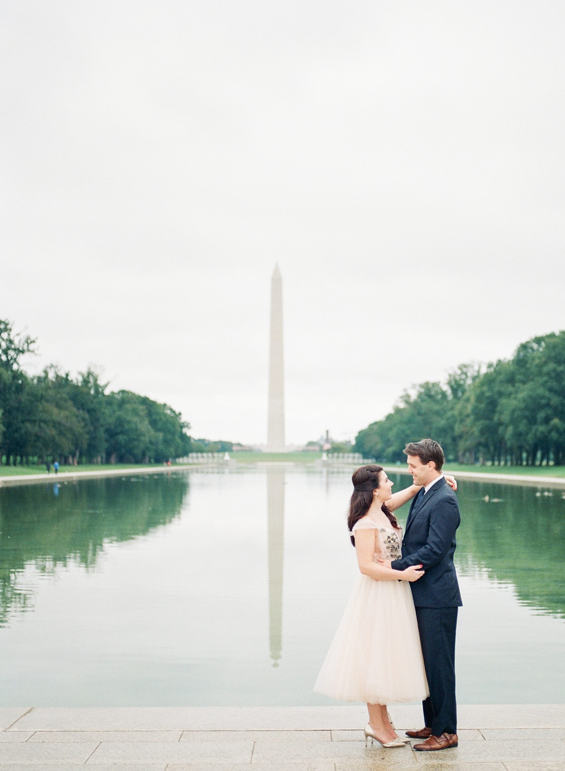 A chic sunrise engagement session at the Lincoln Memorial in Washington DC. Photographed by fine art film photographer, Alicia Lacey.