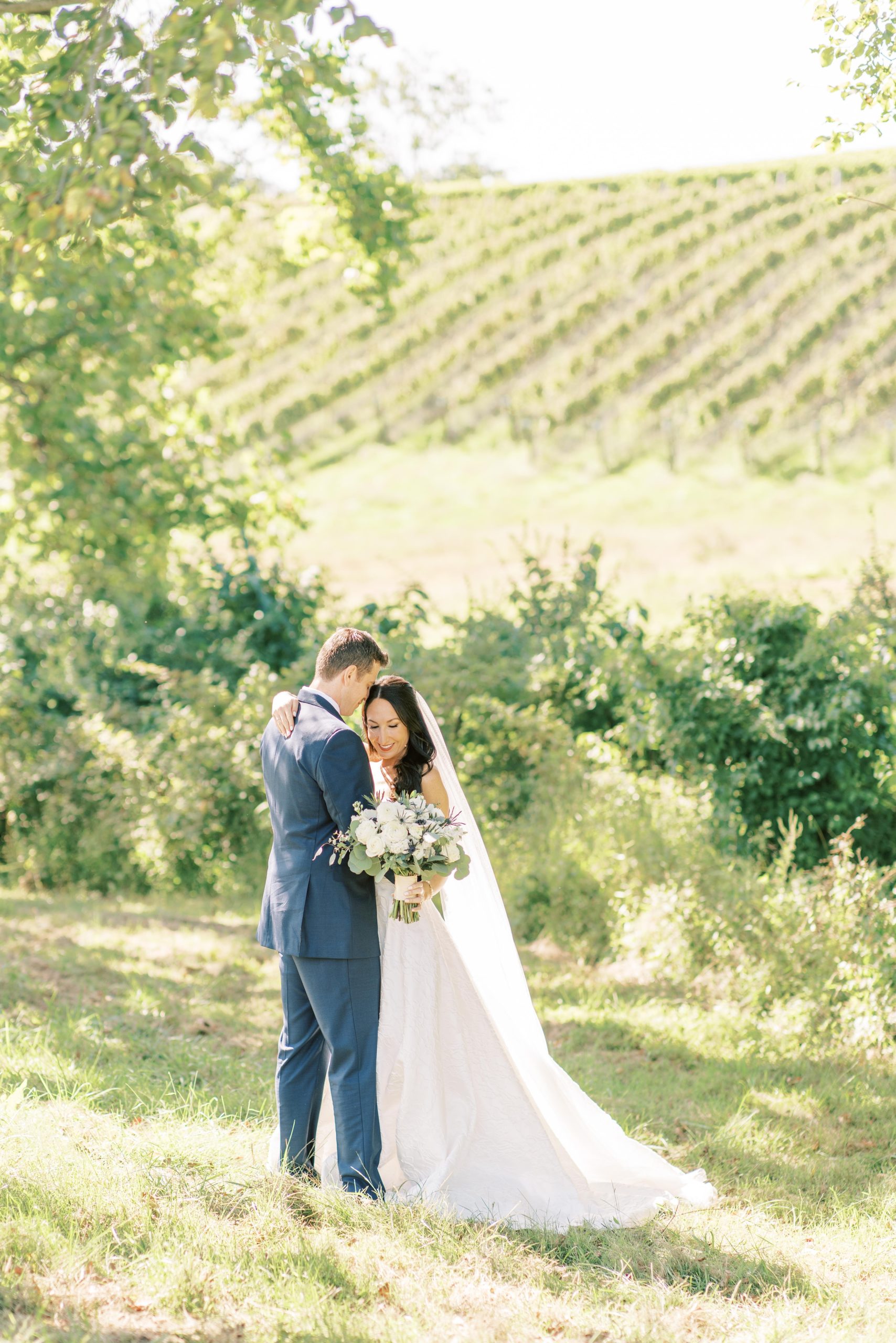 A beautiful outdoor ceremony and reception among the vines at Stone Tower Winery in Leesburg, Virignia, outside of Washington, DC.
