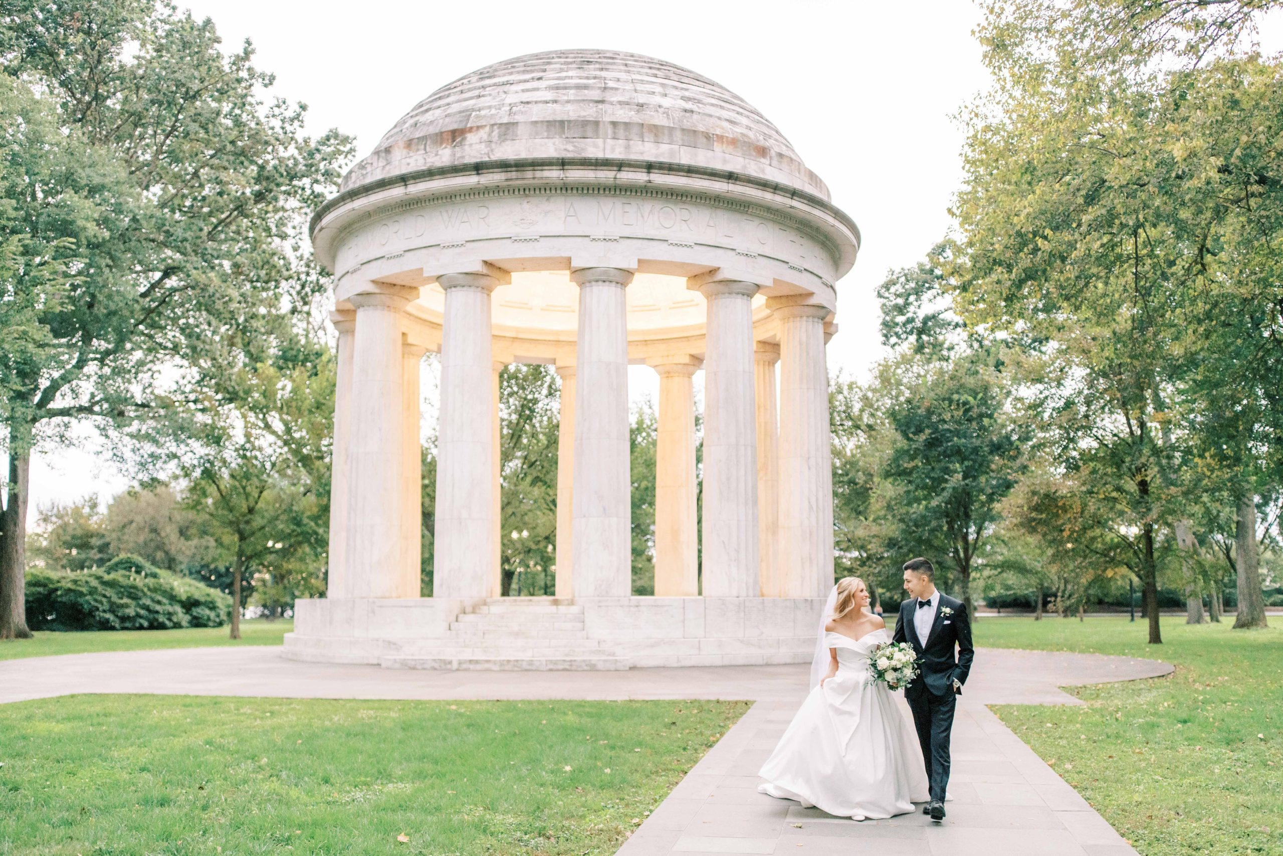 An intimate fall elopement ceremony at the DC War Memorial, followed by portraits at the Lincoln Memorial in Washington, DC.