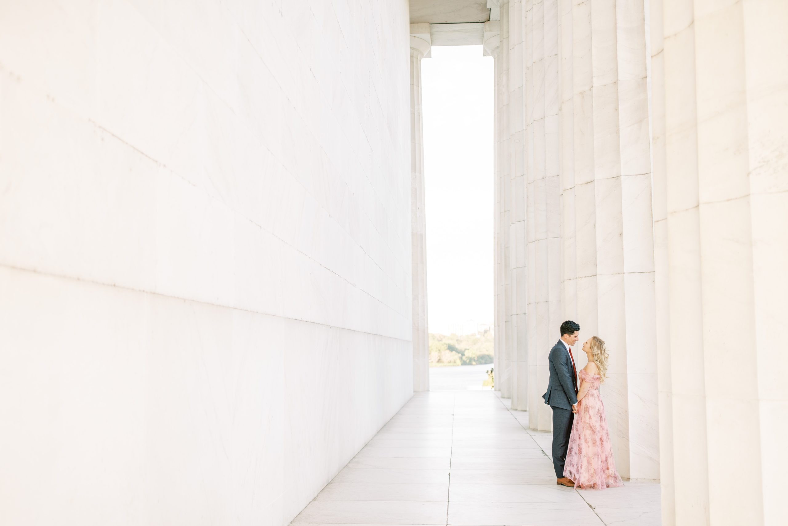 A romantic engagement session with a stylish couple at the Lincoln Memorial and DC War Memorial in Washington, DC.