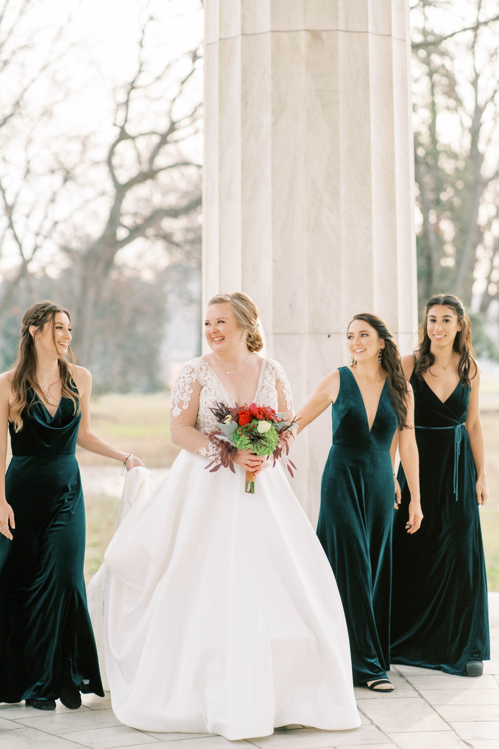 A wintery wedding elopement at the DC War Memorial in Washington, DC with portraits at the Lincoln Memorial and Washington Monument.
