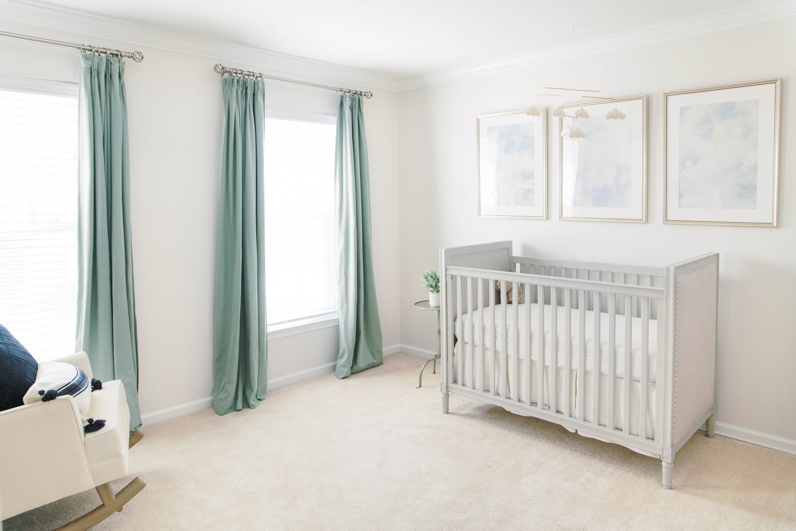 A subtle and elegant travel themed nursery with furniture from the Marcelle collection at Restoration Hardware.