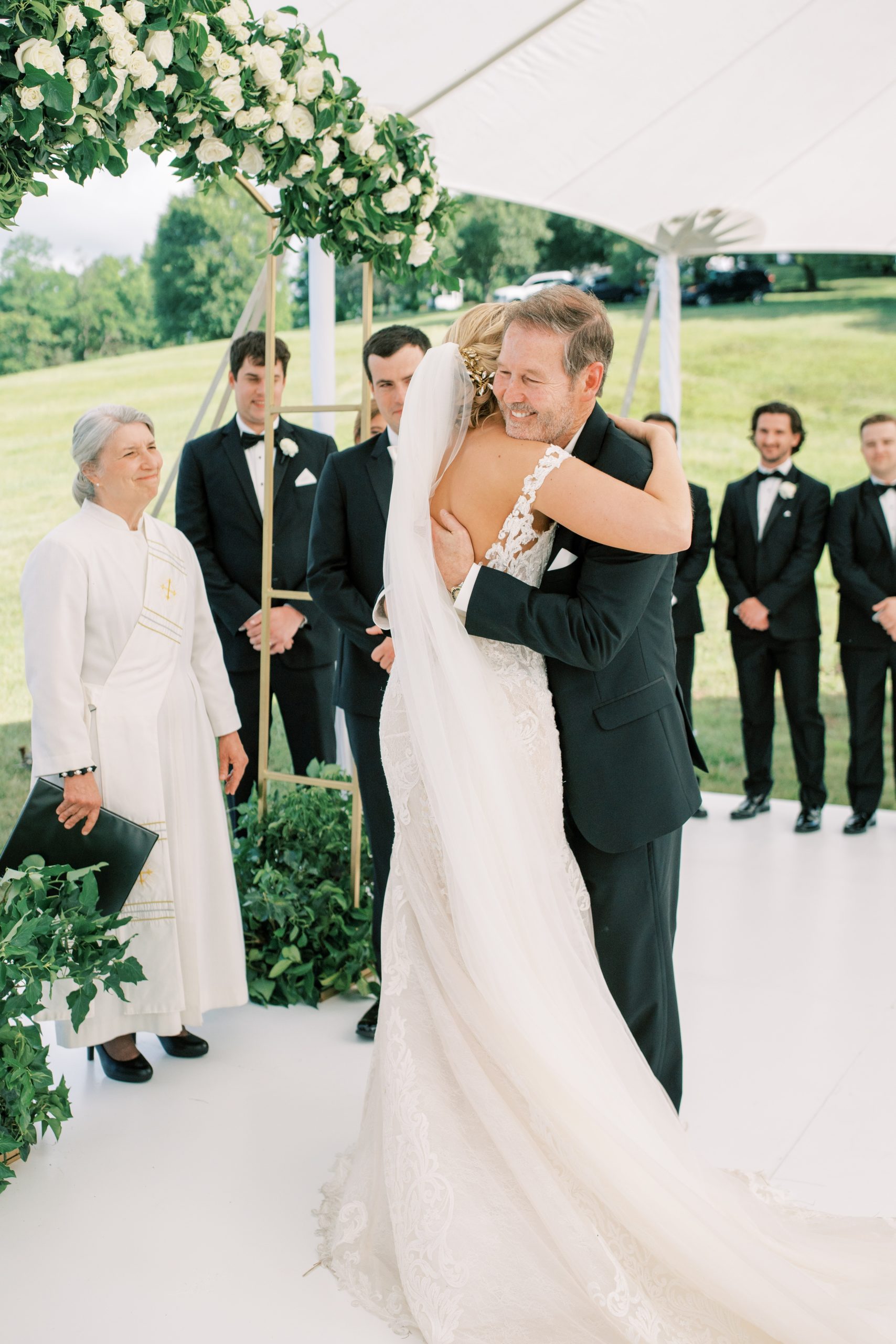 View this elegant, sailcloth-tented wedding at a private estate on the foothills of the Blue Ridge Mountains in Virginia.