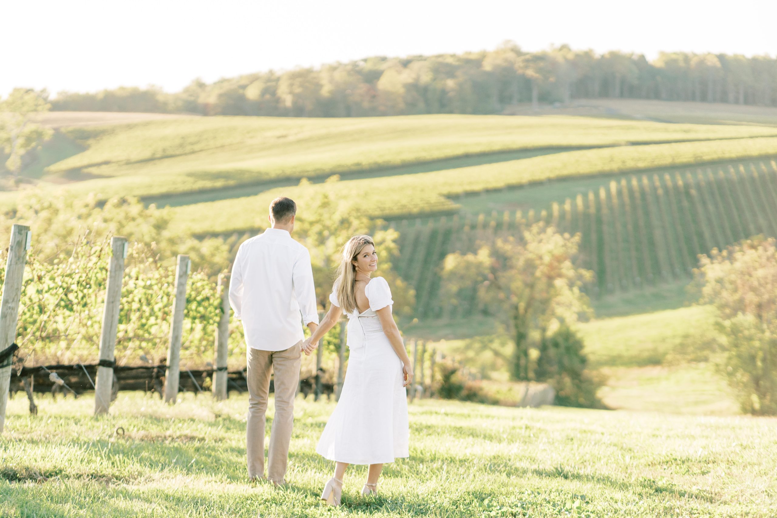 A golden hour engagement session at one of Virginia's most stunning vineyards, Stone Tower Winery, in Leesburg, VA.