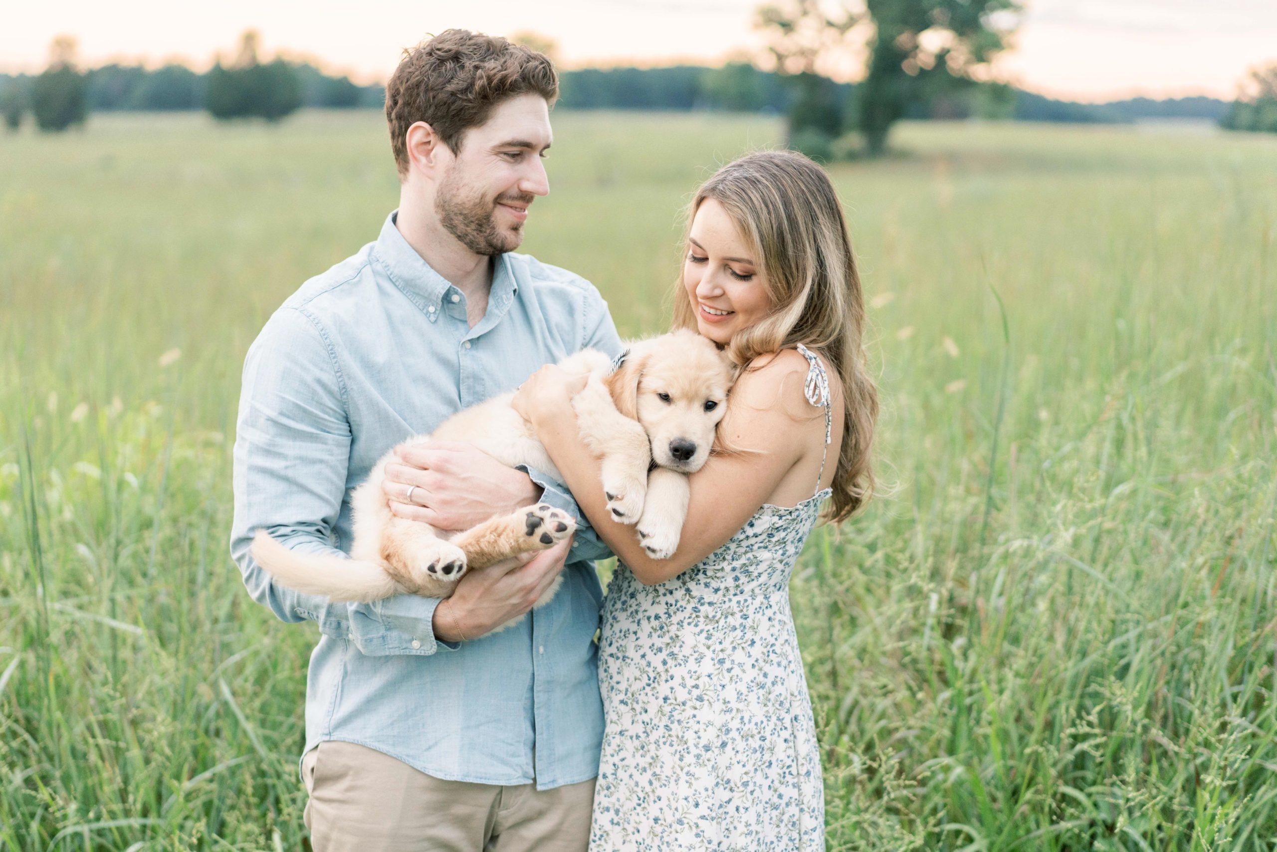 A newborn puppy photoshoot with the adorable couple who adopted him in Washington, DC. 