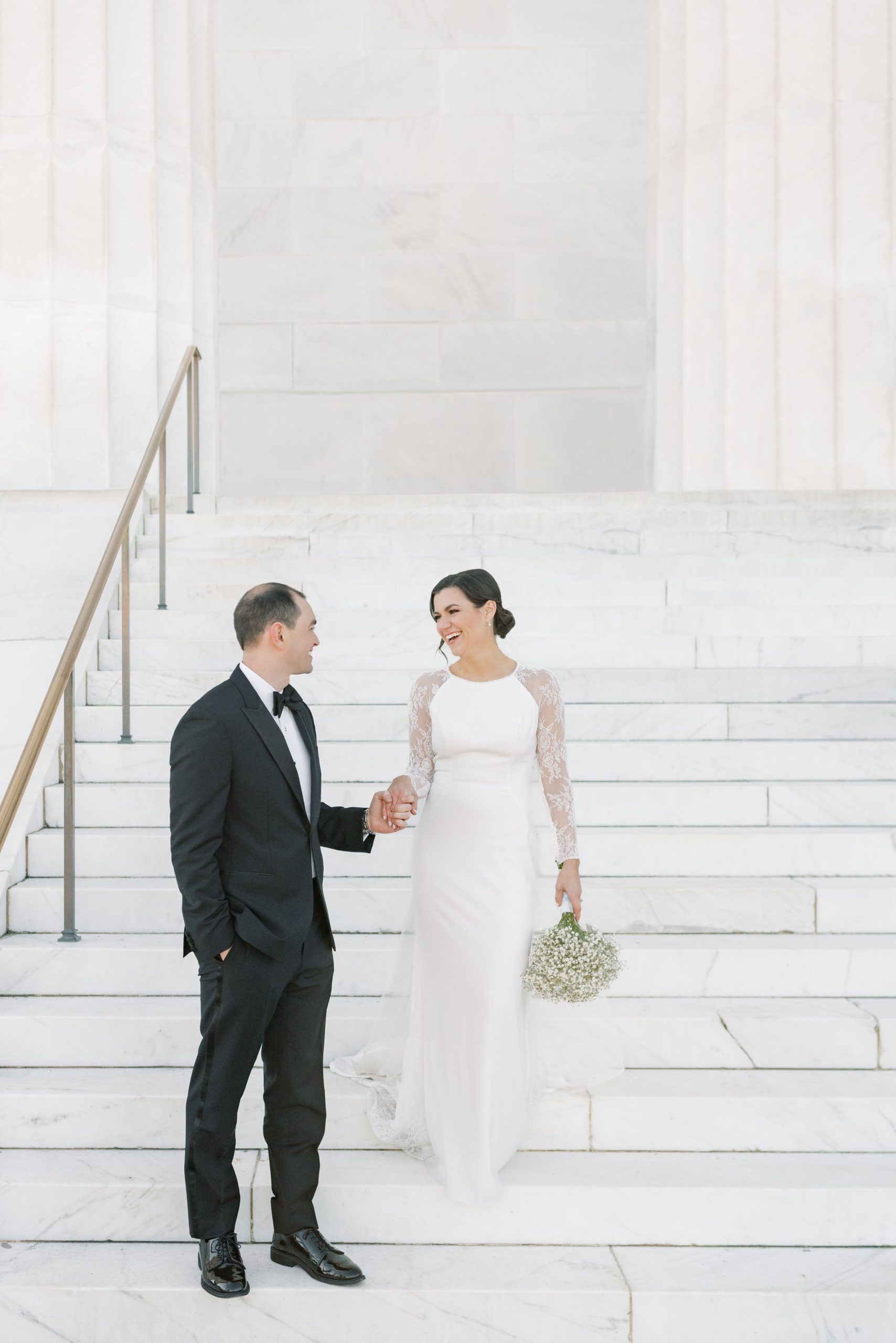 An intimate winter microwedding at St Dominic Church is Washington, DC followed by wedding portraits at the Lincoln Memorial.