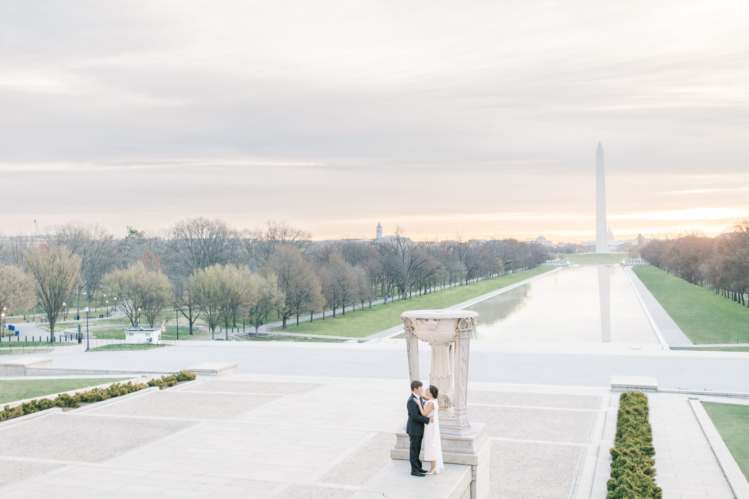 Washington Monument and Reflecting Pool engagement photos at sunrise in Washington, DC