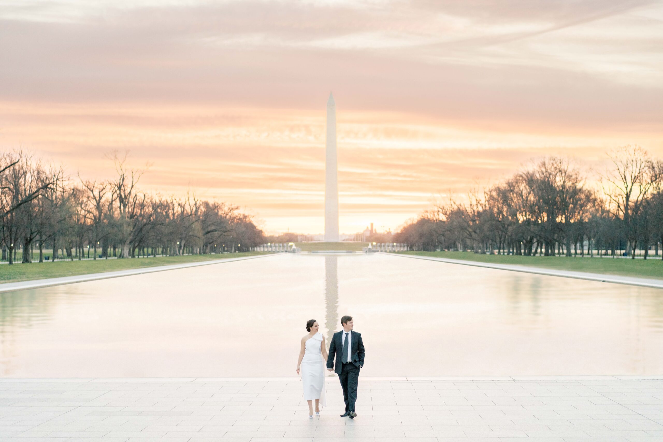 Washington Monument and Reflecting Pool engagement photos at sunrise in Washington, DC