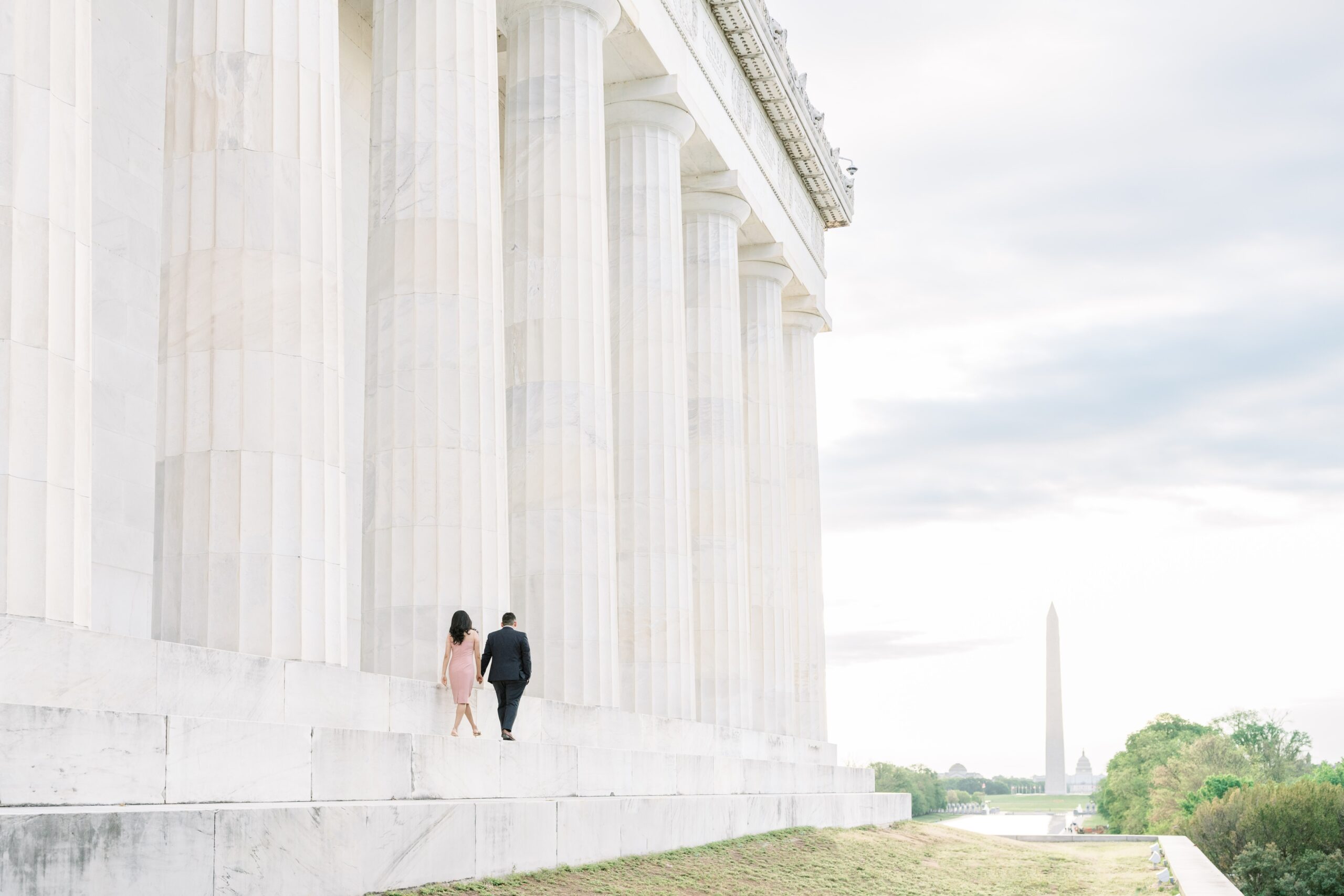 A quiet sunrise engagement photo session at the Lincoln Memorial and Reflecting Pool in Washington, DC.