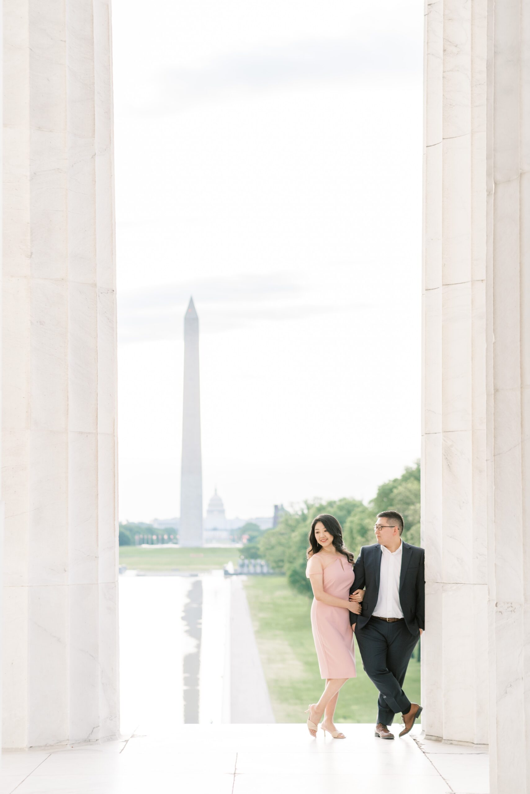 A quiet sunrise engagement photo session at the Lincoln Memorial and Reflecting Pool in Washington, DC.