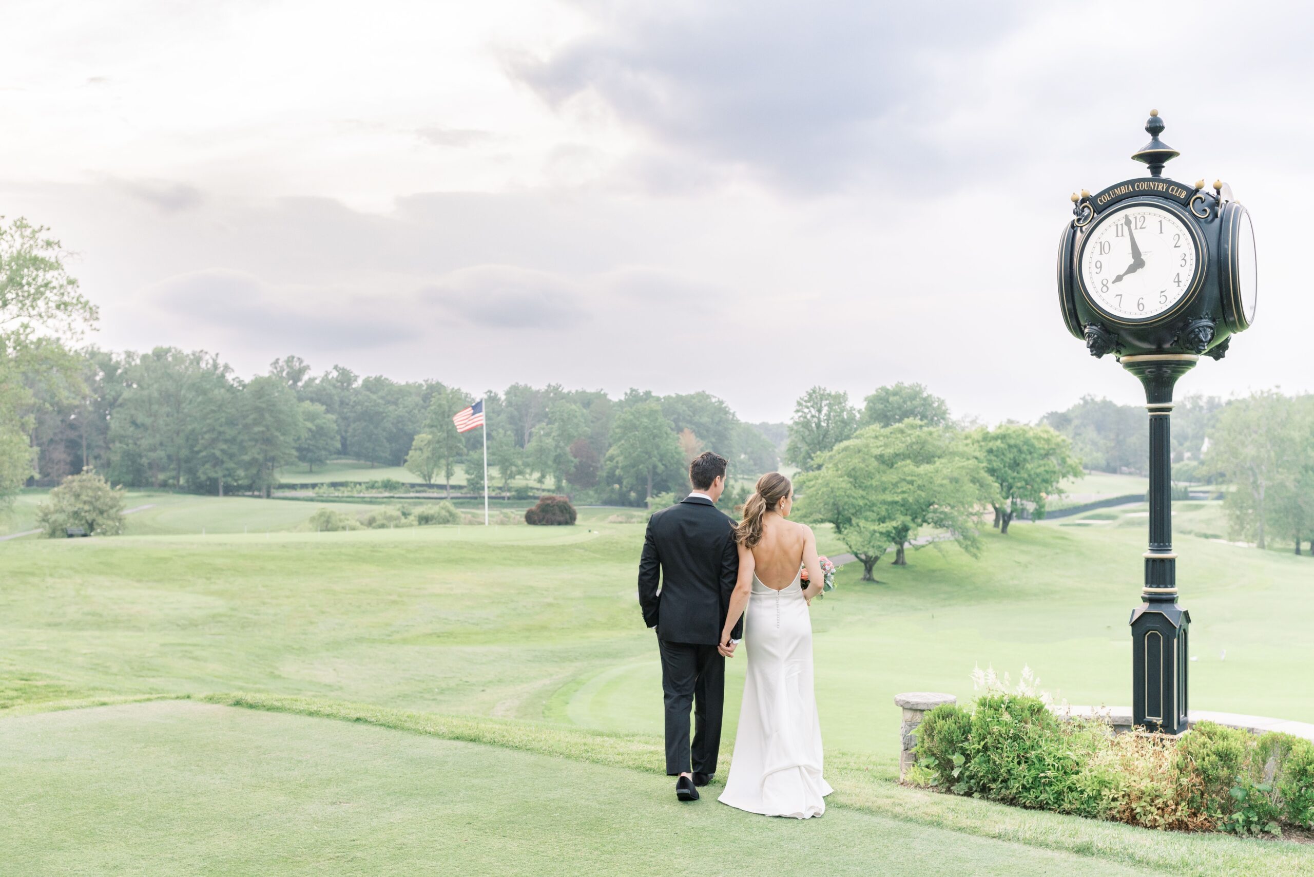 A elegant Columbia Country Club Wedding featuring a romantic garden-esque reception.