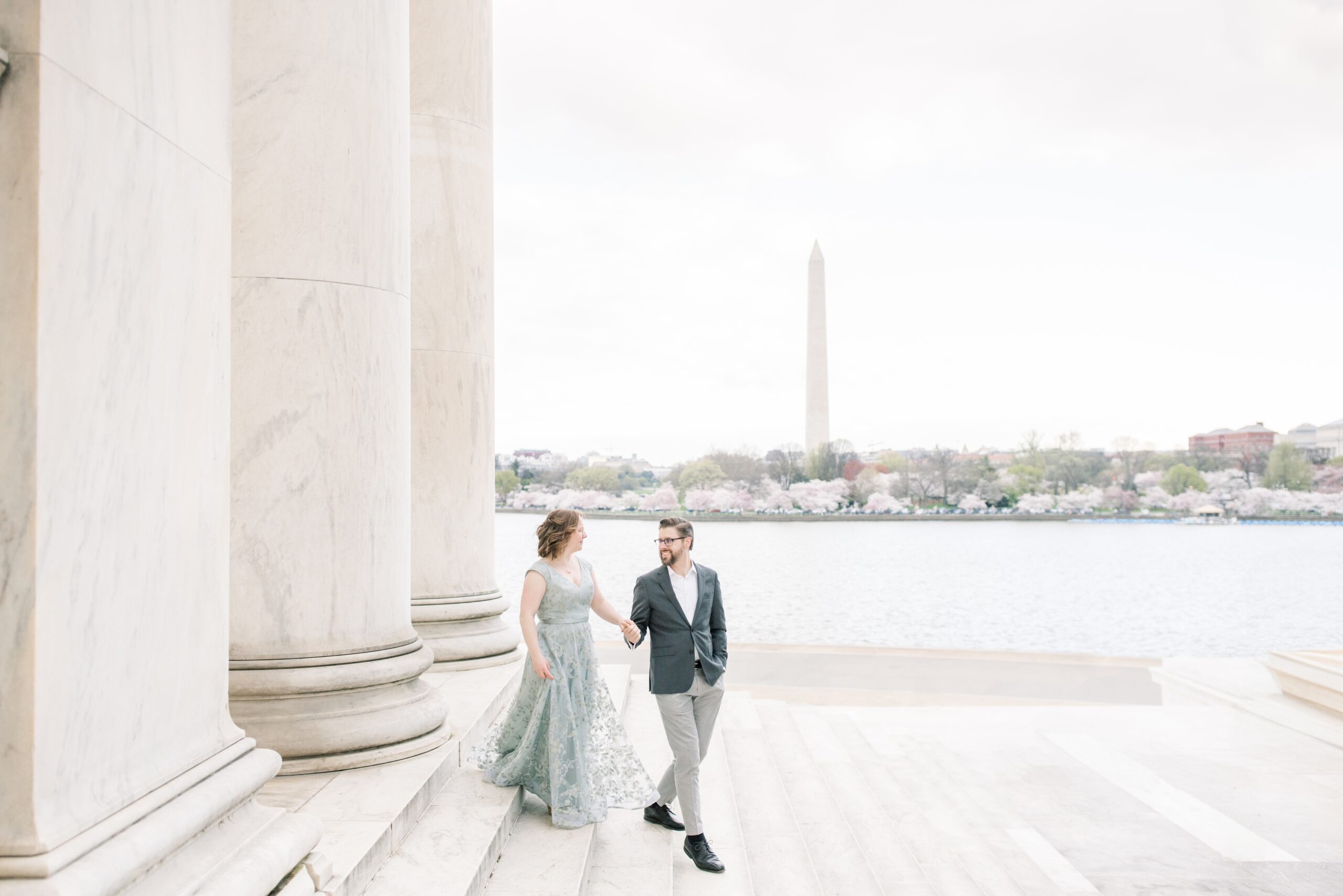 A stunning cherry blossom anniversary session at the Tidal Basin in Washington, DC during peak bloom.