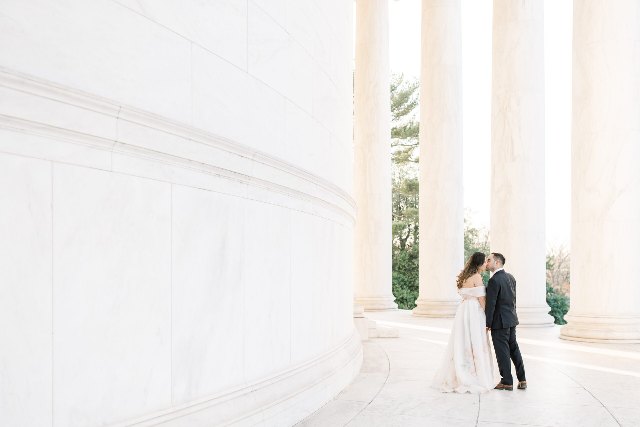 Spring engagement portraits at the Jefferson Memorial in Washington, DC. Includes a few photos amongst the iconic Cherry Blossoms!