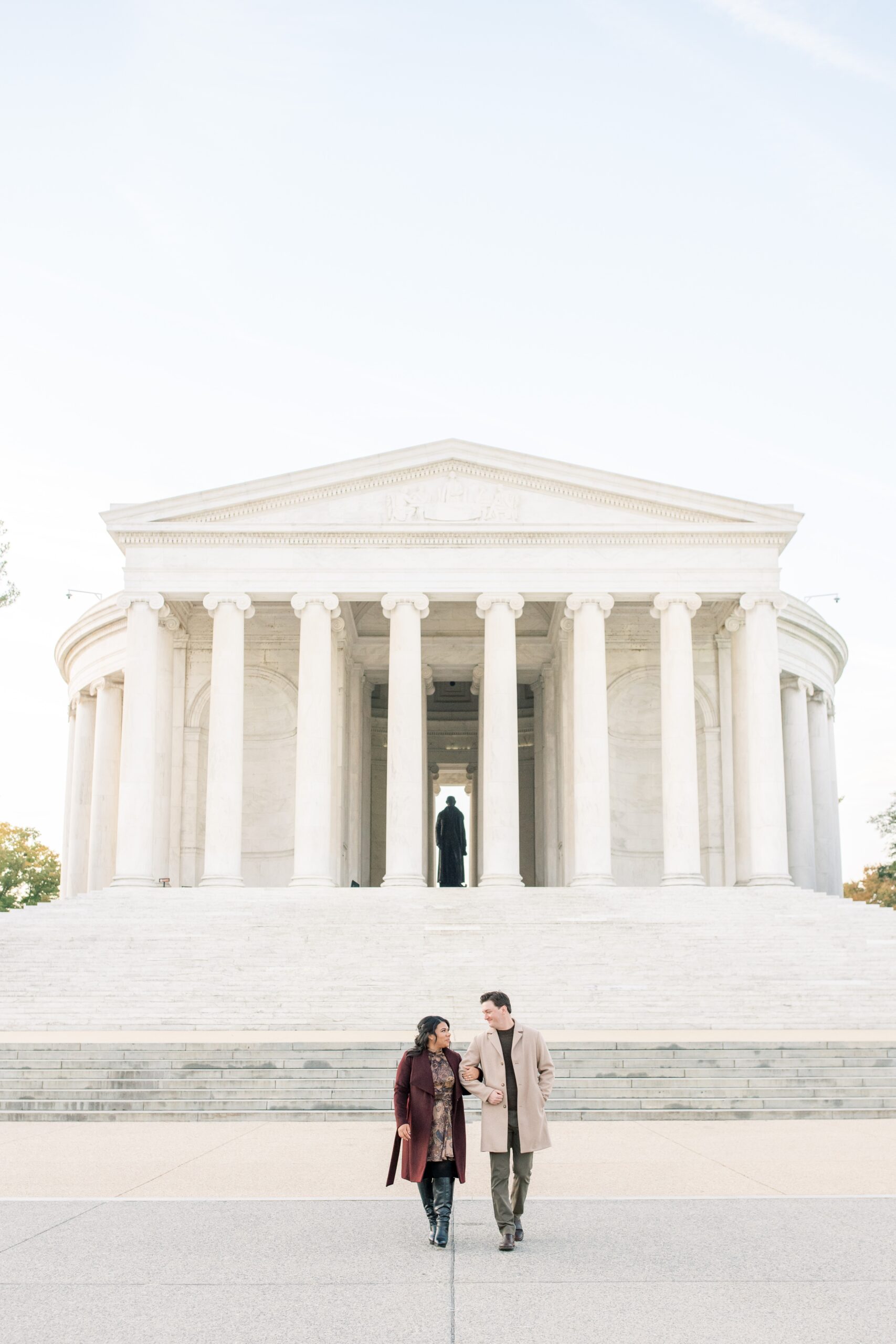 A beautiful sunrise anniversary session this fall at the Jefferson Memorial in Washington, DC.