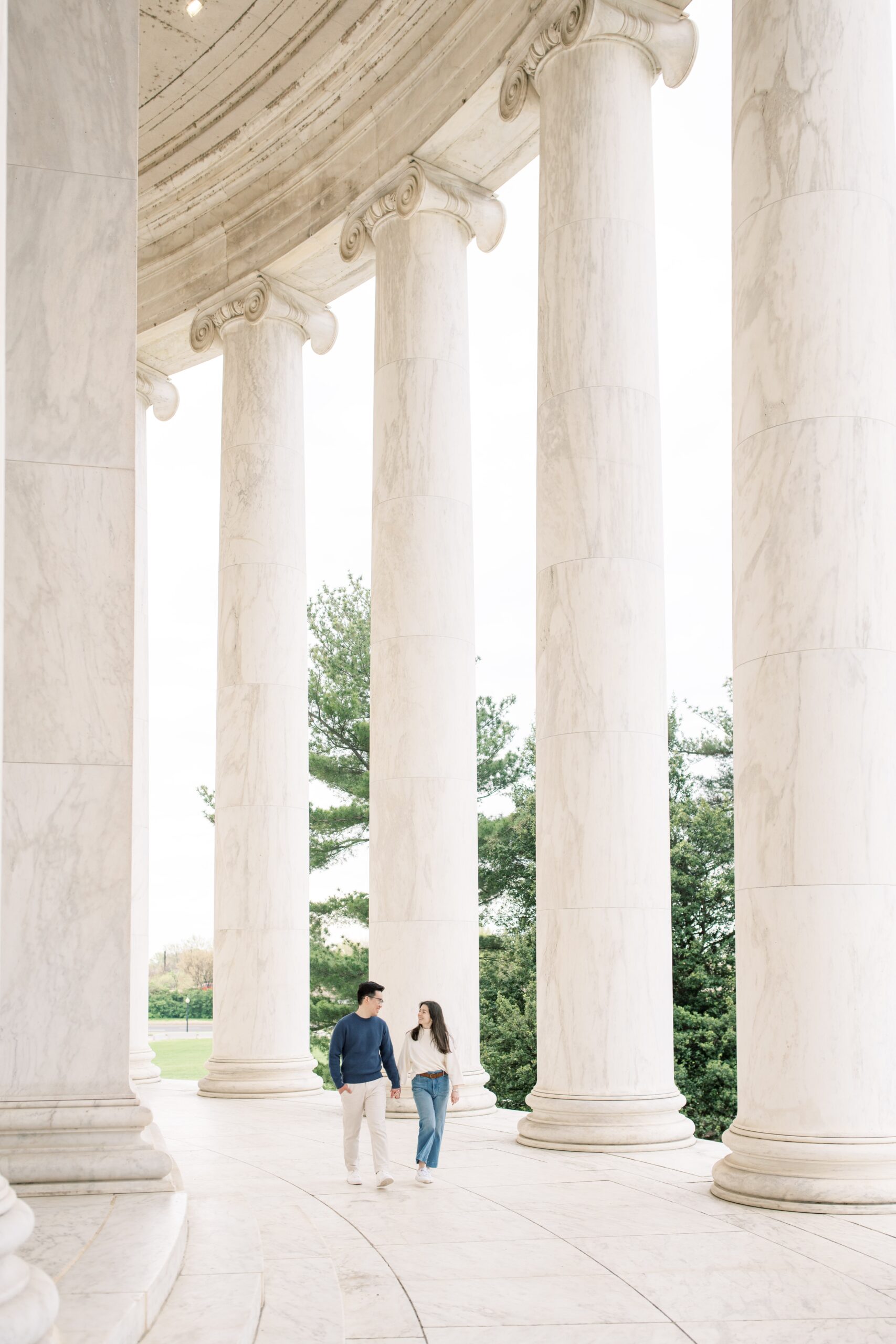 A sunrise engagement session at the National Mall in Washington, DC, featuring portraits at the Jefferson Memorial and Reflecting Pool.